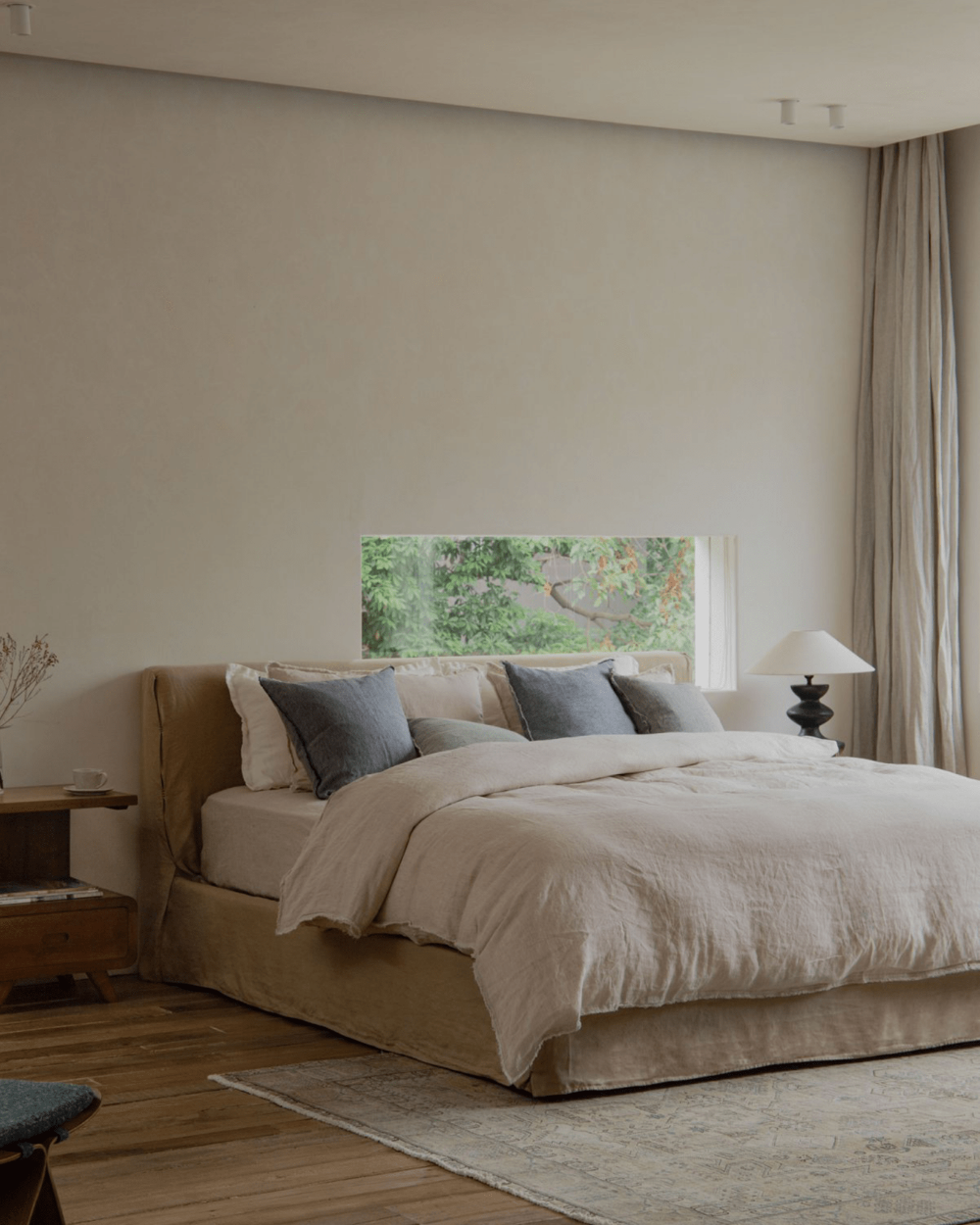 Freya Linen Bed in neutral bedroom, natural linen bedding, modern design, and peaceful sleep.