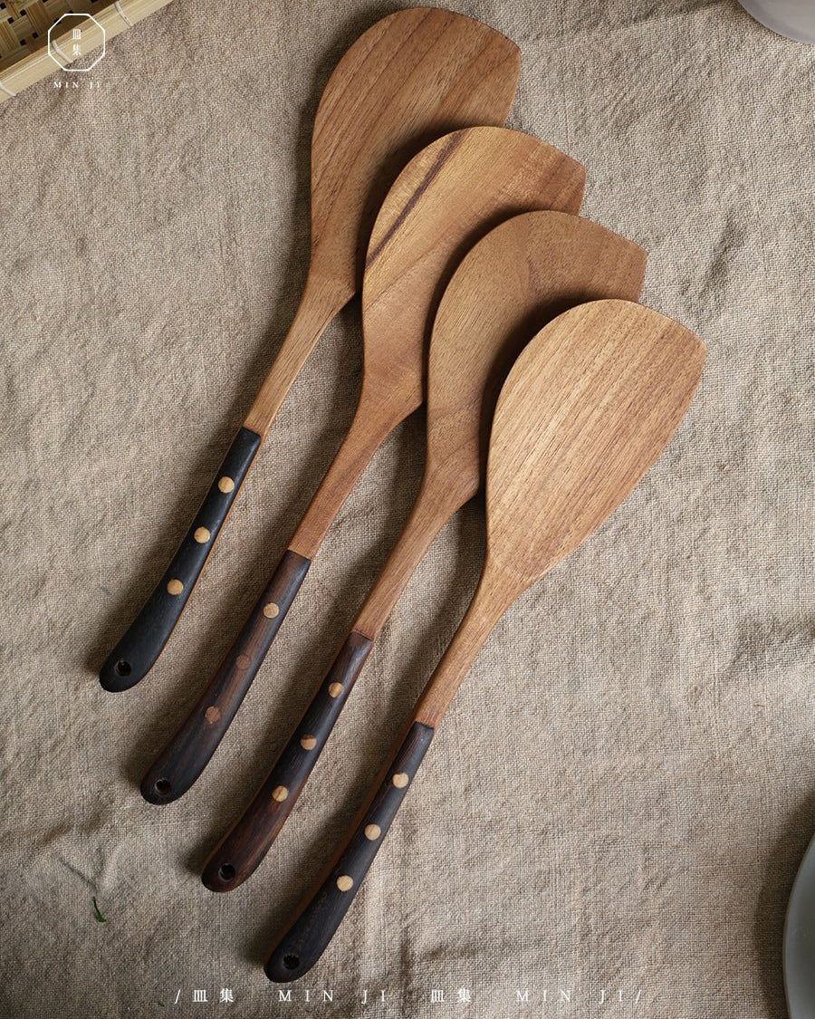 Teak wood fried spatulas with dark accent handles, set of four.