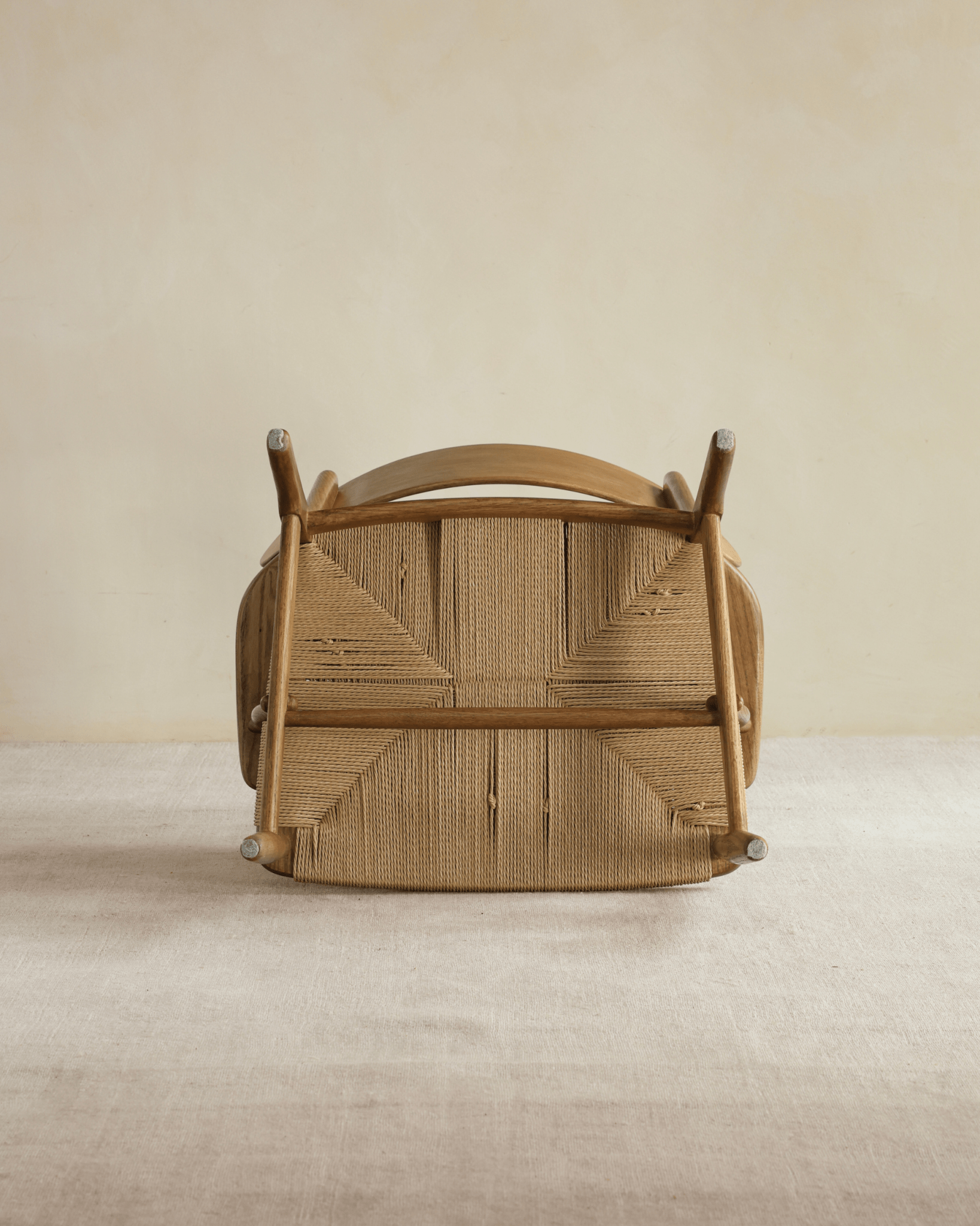 CH22 Lounge Chair upside down; oak frame, paper cord seat; Scandinavian design