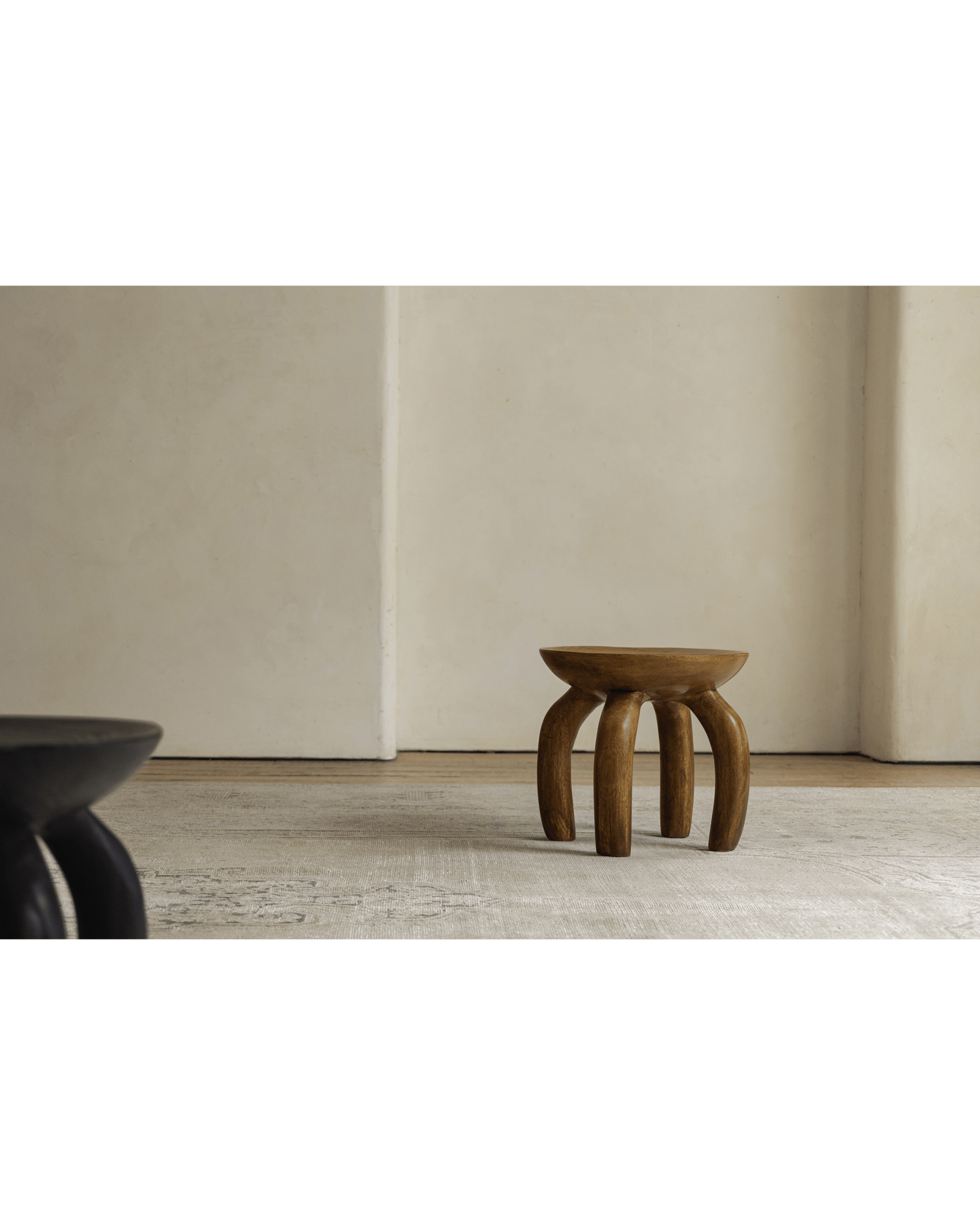 Wooden Jelly Stool in living room, handcrafted solid wood furniture, sustainable design