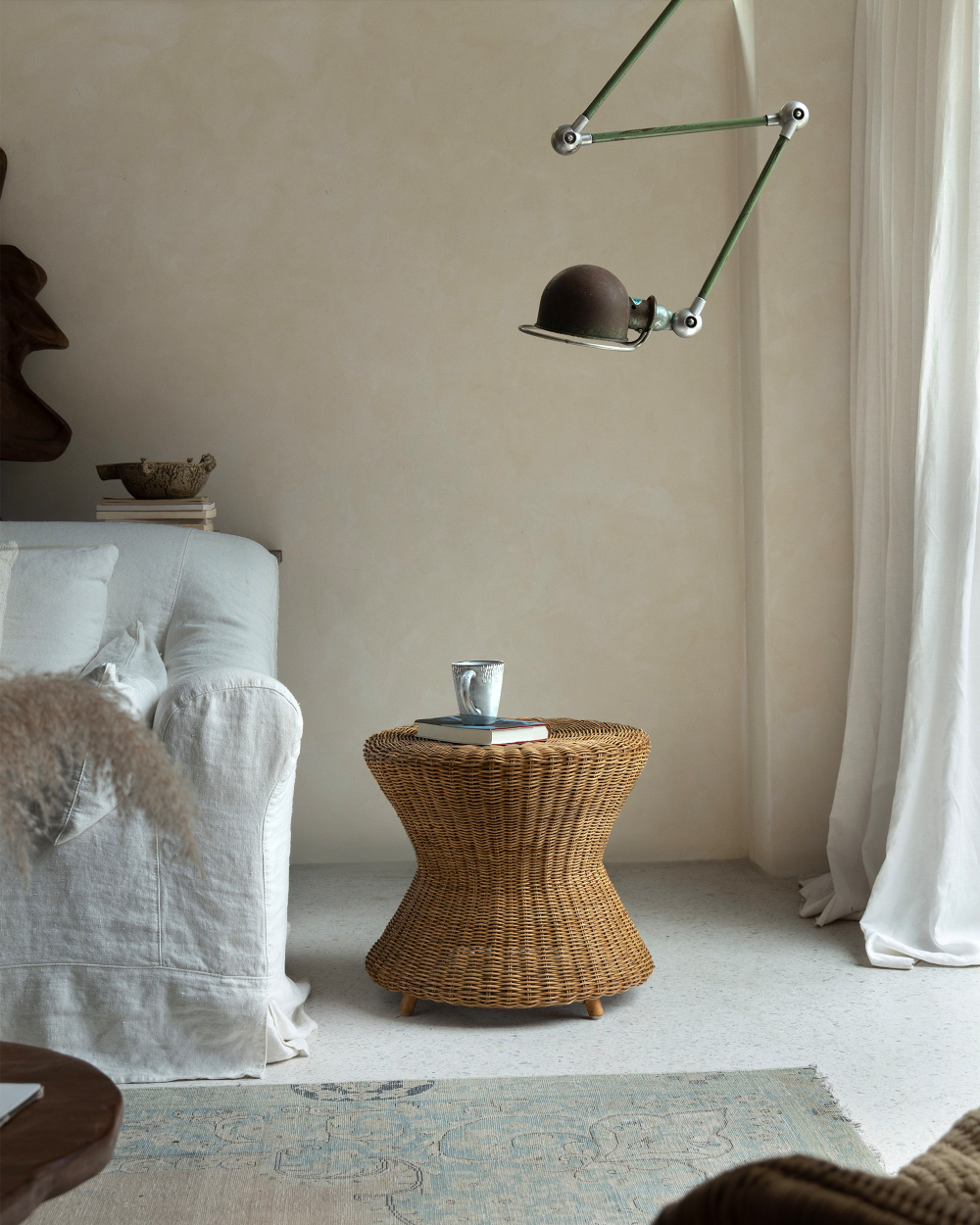 Bongo Rattan Side Table, spiral rattan weave, hourglass shape.