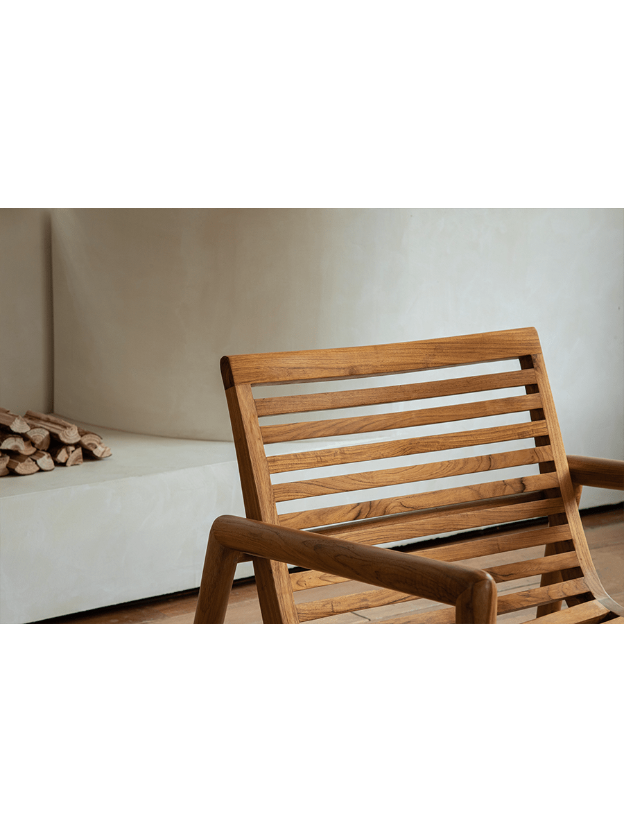 Teak wood garden lounge chair with slatted back and armrests, modern design