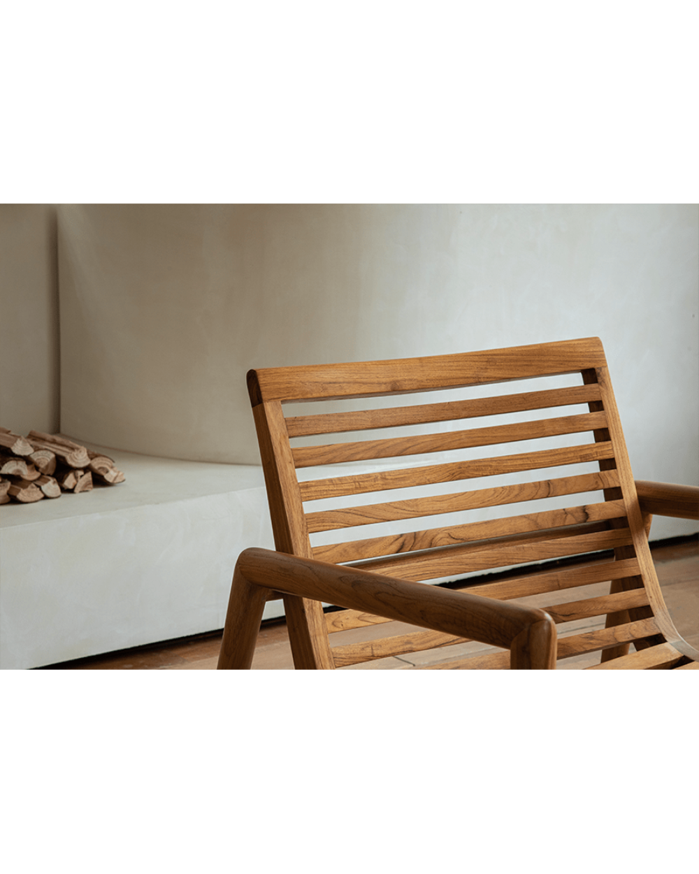 Teak wood garden lounge chair with slatted back and armrests, modern design
