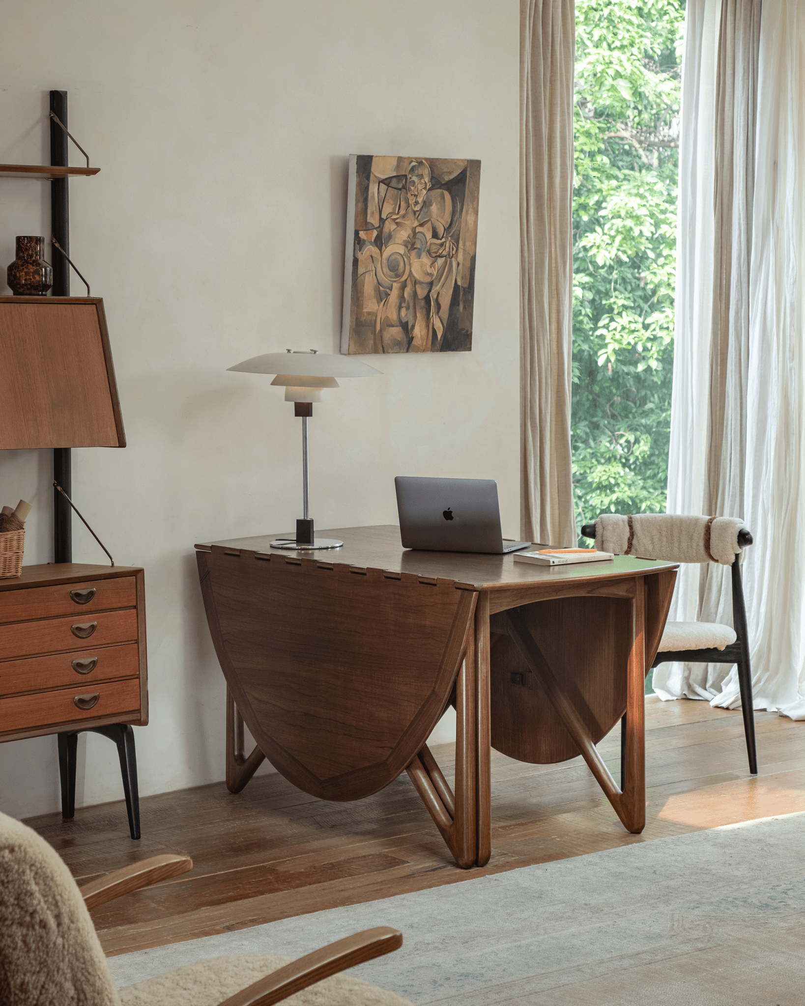 Niels Folding Table in use, teak wood desk with laptop, mid-century modern design