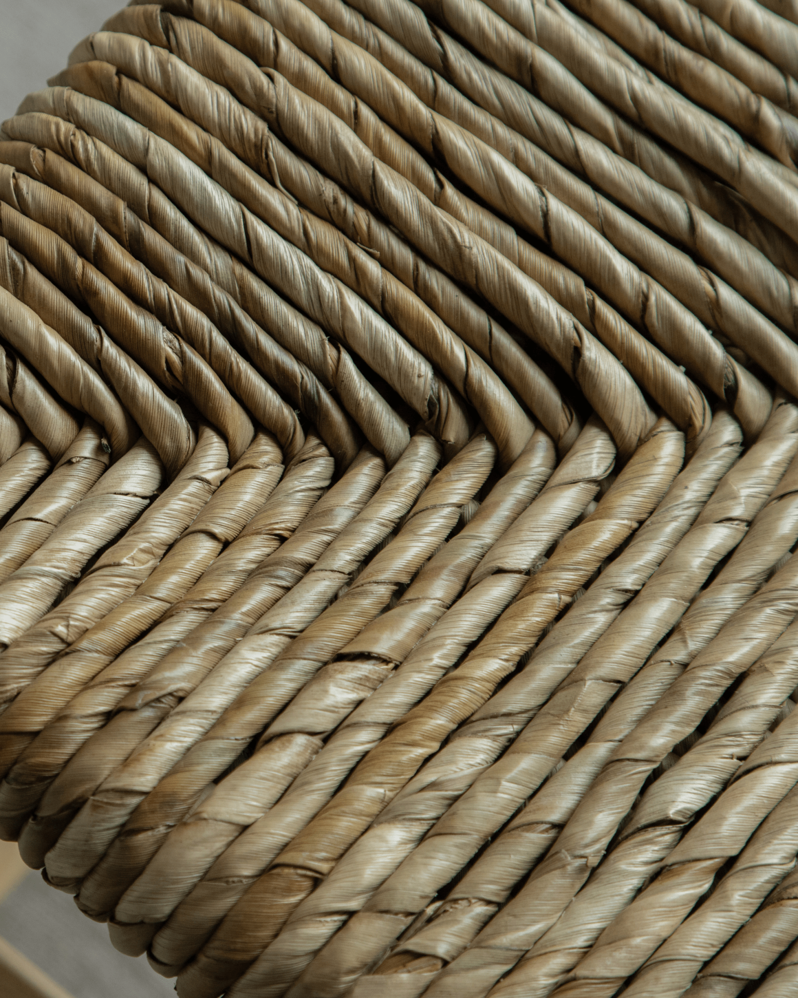 Close-up of woven pandan leaf seat detail. Natural, textured, and perfect for the Isla Handwoven Stool.