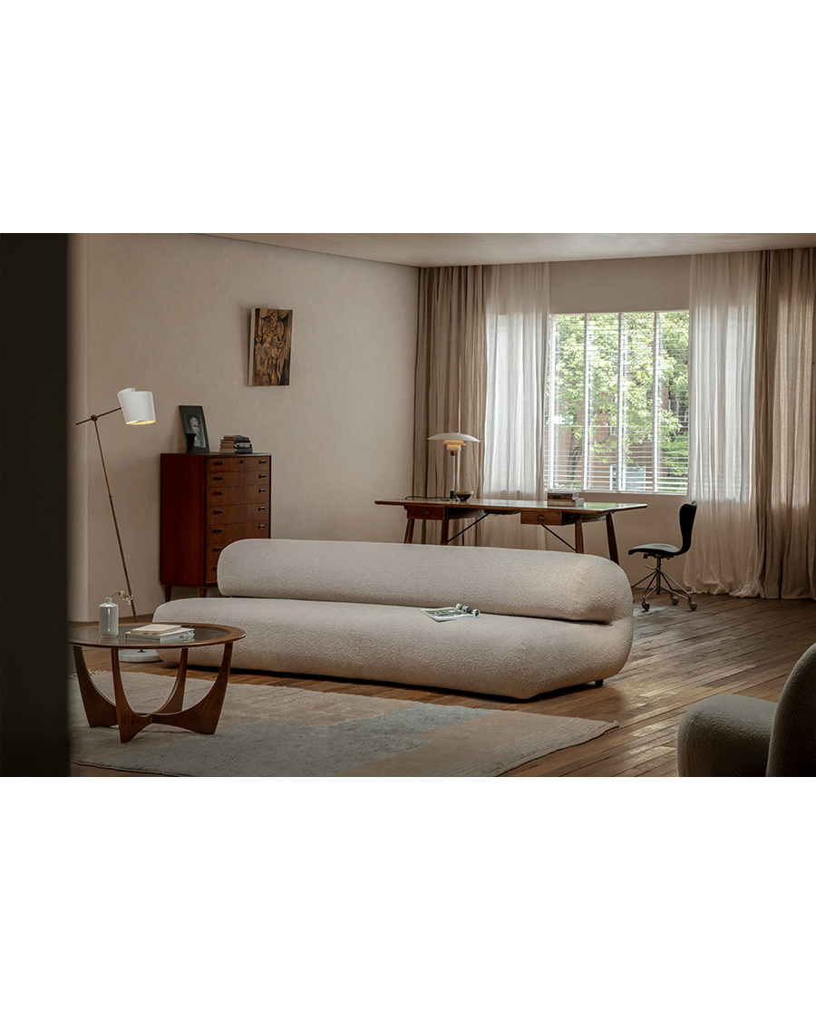 Beige Wave Bouclé Sofa in a modern living room. Bouclé fabric, unique wave design, and stylish interior setting.