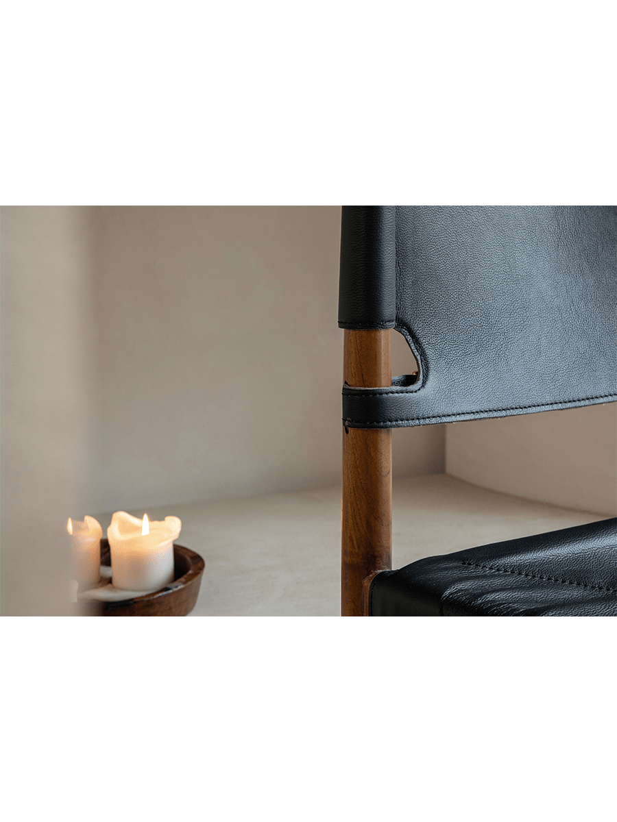 Spanish Dining Chair detail: Black leather seat and back, teak wood frame, durable design