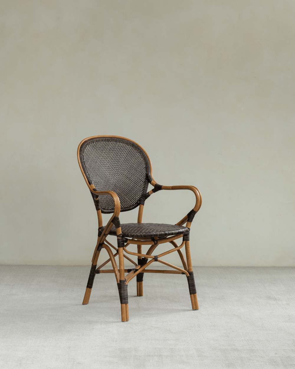 Areca Rattan Chair with handwoven rattan and armrests, natural brown finish, comfortable design