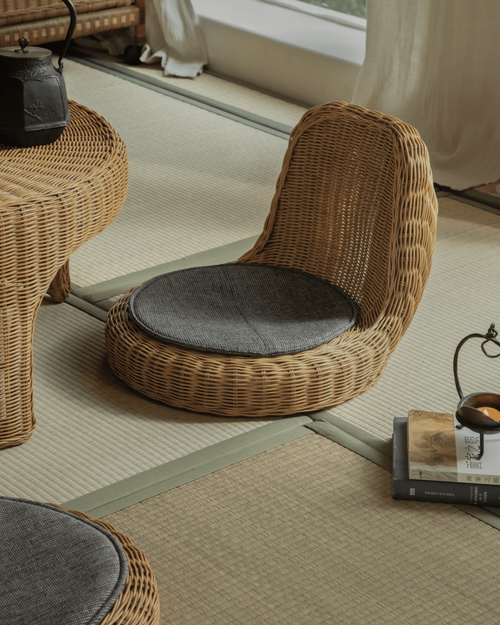 Lotus Tatami Set - Rattan chair with gray cushion on tatami mat for zen tea room
