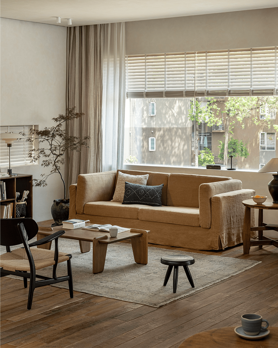 Beige Skirt Linen Sofa in modern living room, demonstrating comfort and design, perfect for a peaceful atmosphere.