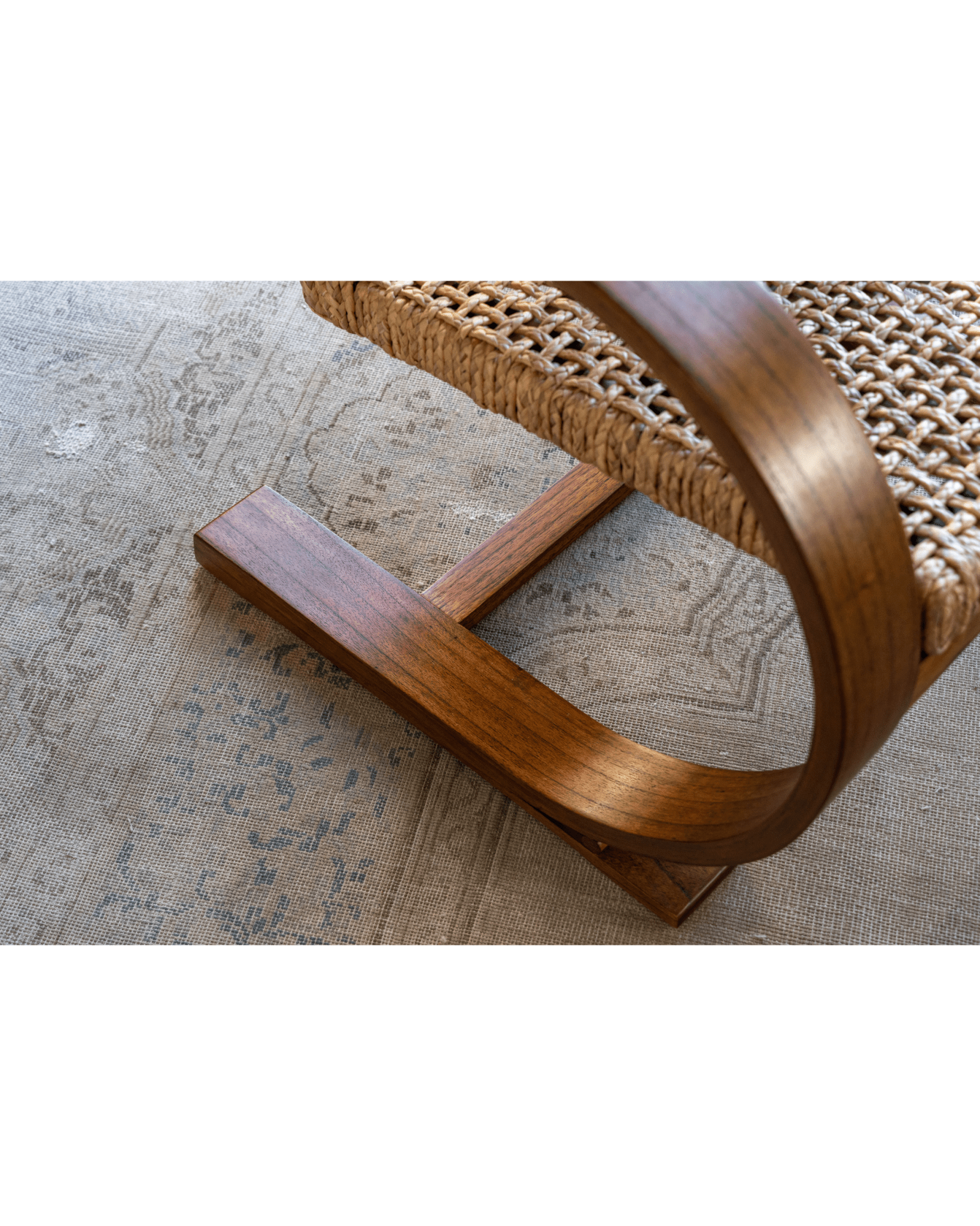 C Curve Lounge Chair detail: bentwood frame, woven grass rope seat, mid-century modern design