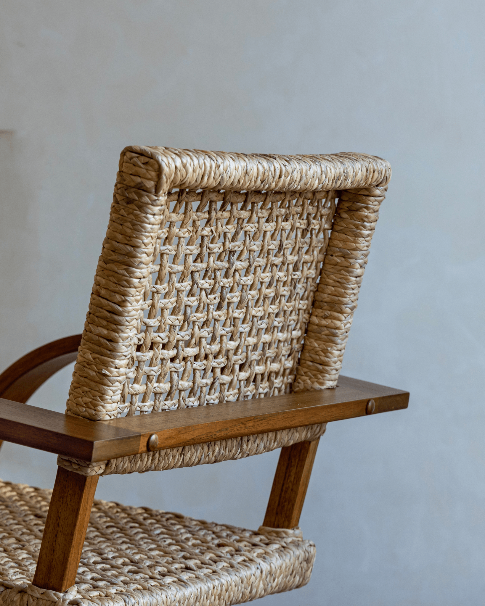 C Curve Lounge Chair detail: woven grass rope back and seat, bentwood frame, mid-century modern design.