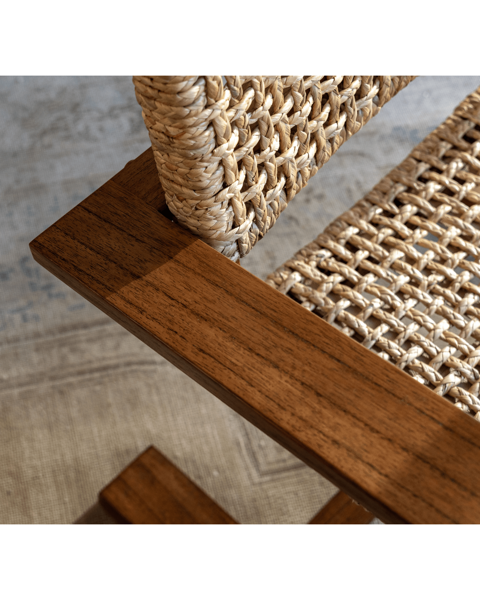 C Curve Lounge Chair detail: bentwood frame and woven grass rope seat, mid-century modern design