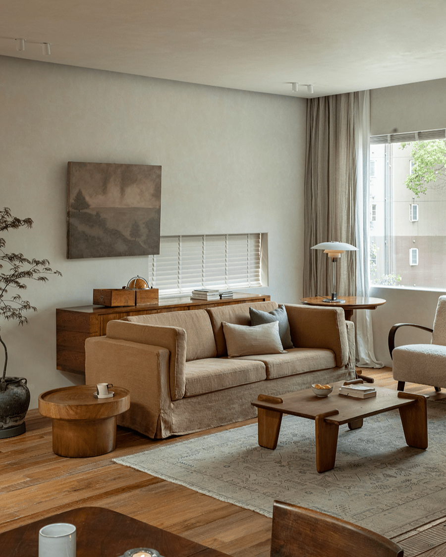 Beige Skirt Linen Sofa in a modern living room with wooden furniture, creating a peaceful atmosphere