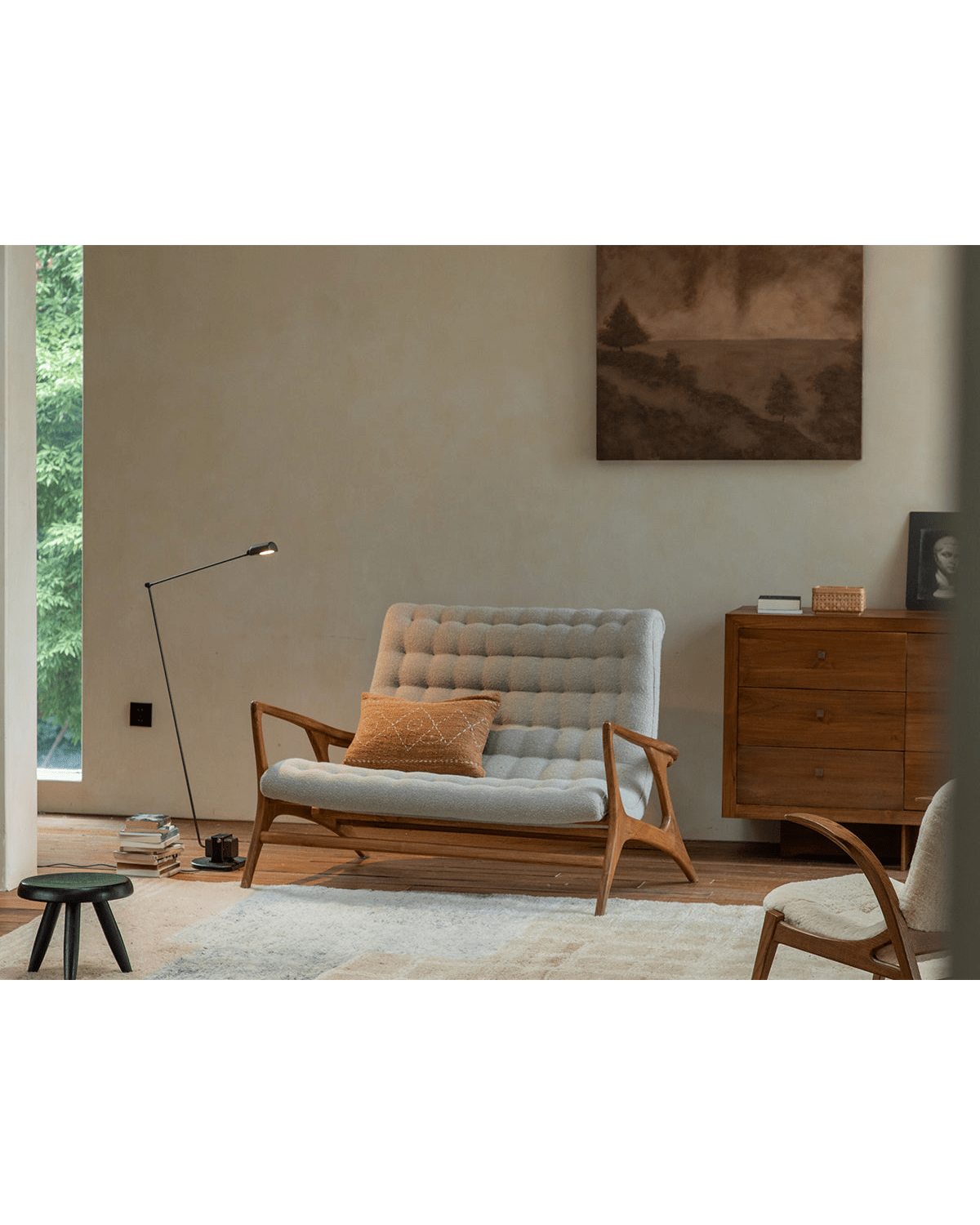 Kagan Loveseat in light gray bouclé upholstery with teak frame, mid-century modern design, cozy living room