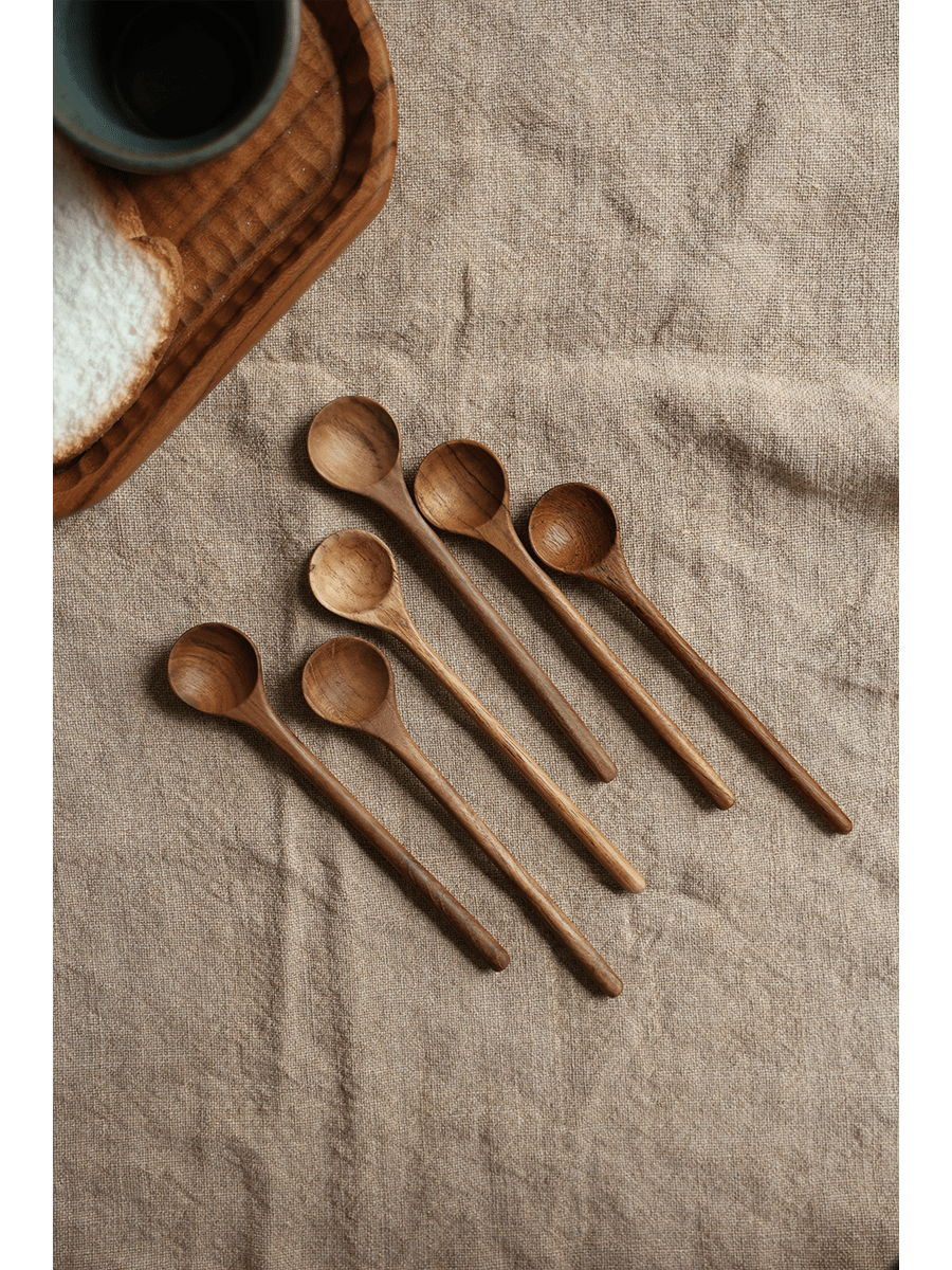 Set of six wooden table spoons on beige linen fabric. Table Spoon*4PCS.
