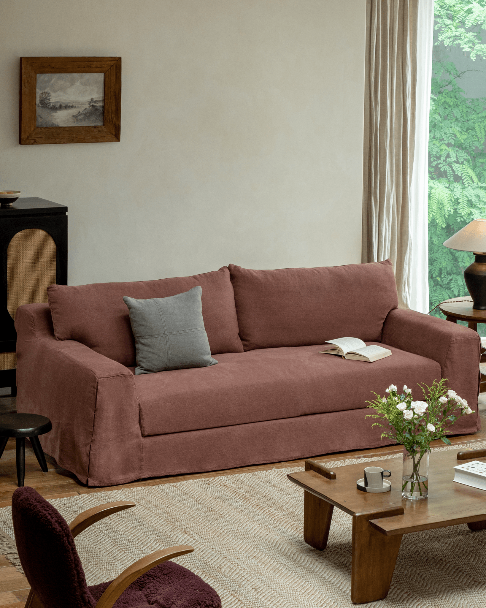 Guni Linen Sofa in terracotta color, with linen fabric and a cozy atmosphere.