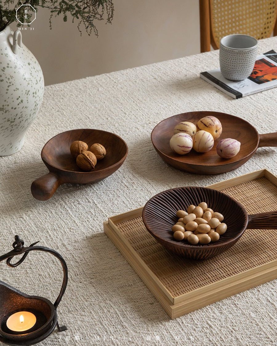 Fany Tray: MIN JI teak wood serving platter with fruit, and bowls with nuts.