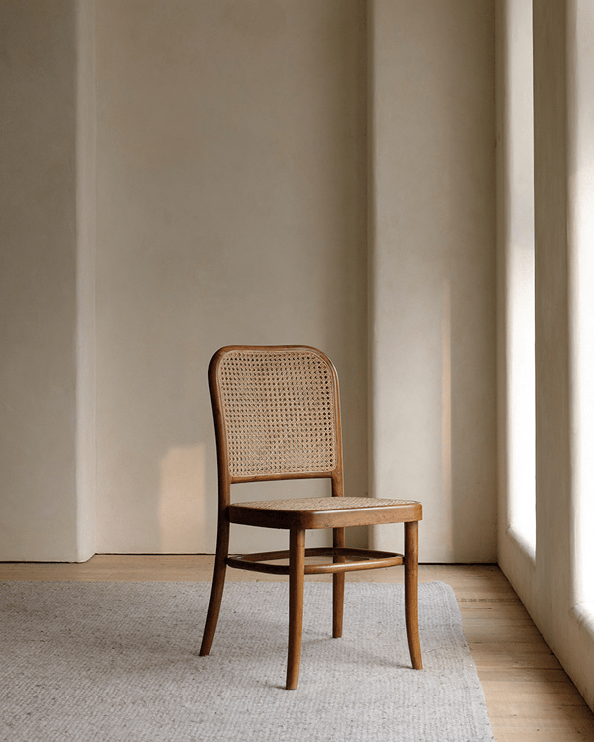 NO.811 Chair in teak with rattan weaving, mid-century modern design for versatile interior use