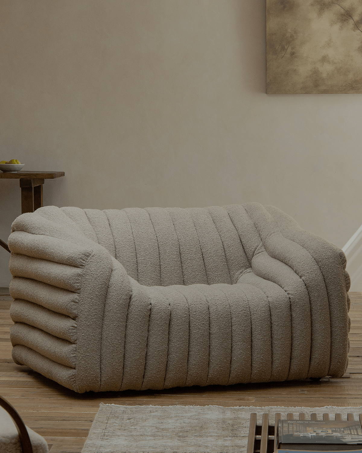 Miche Sofa in beige with vertical ribbed design, soft and comfortable, ideal for cozy living spaces.