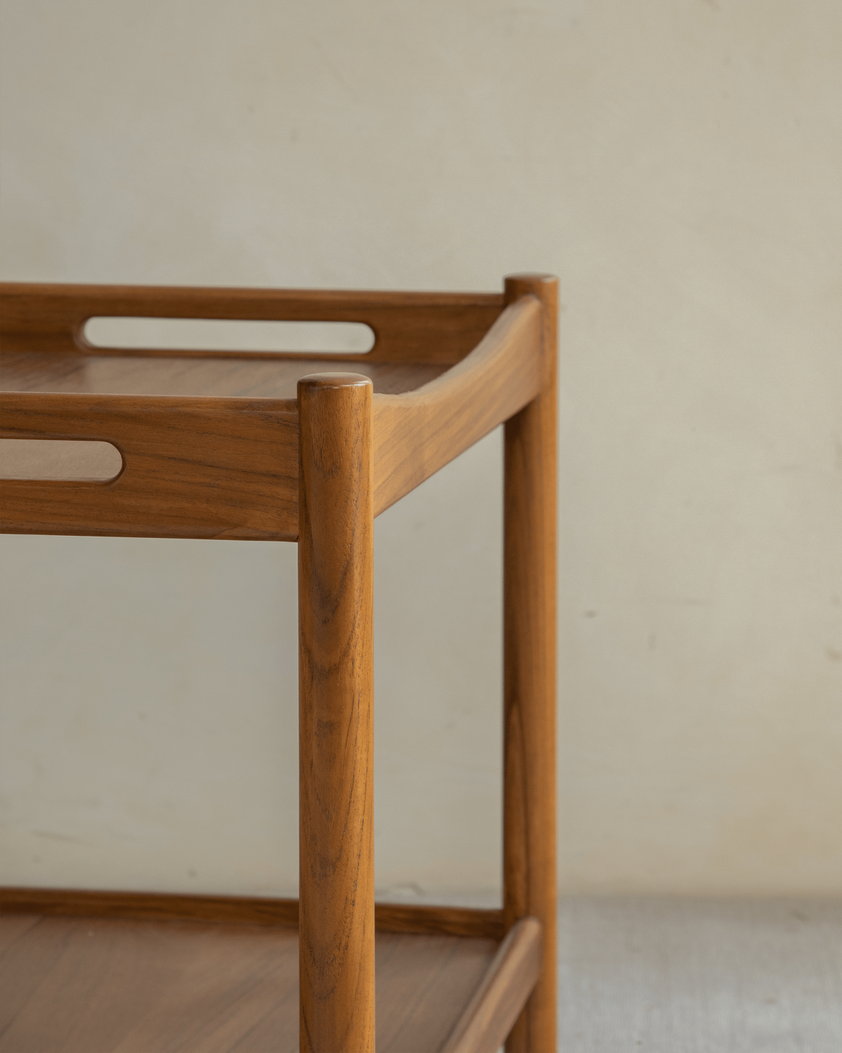 Brooklyn Bar Cart detail: showcasing wooden frame and handle, a stylish storage solution.