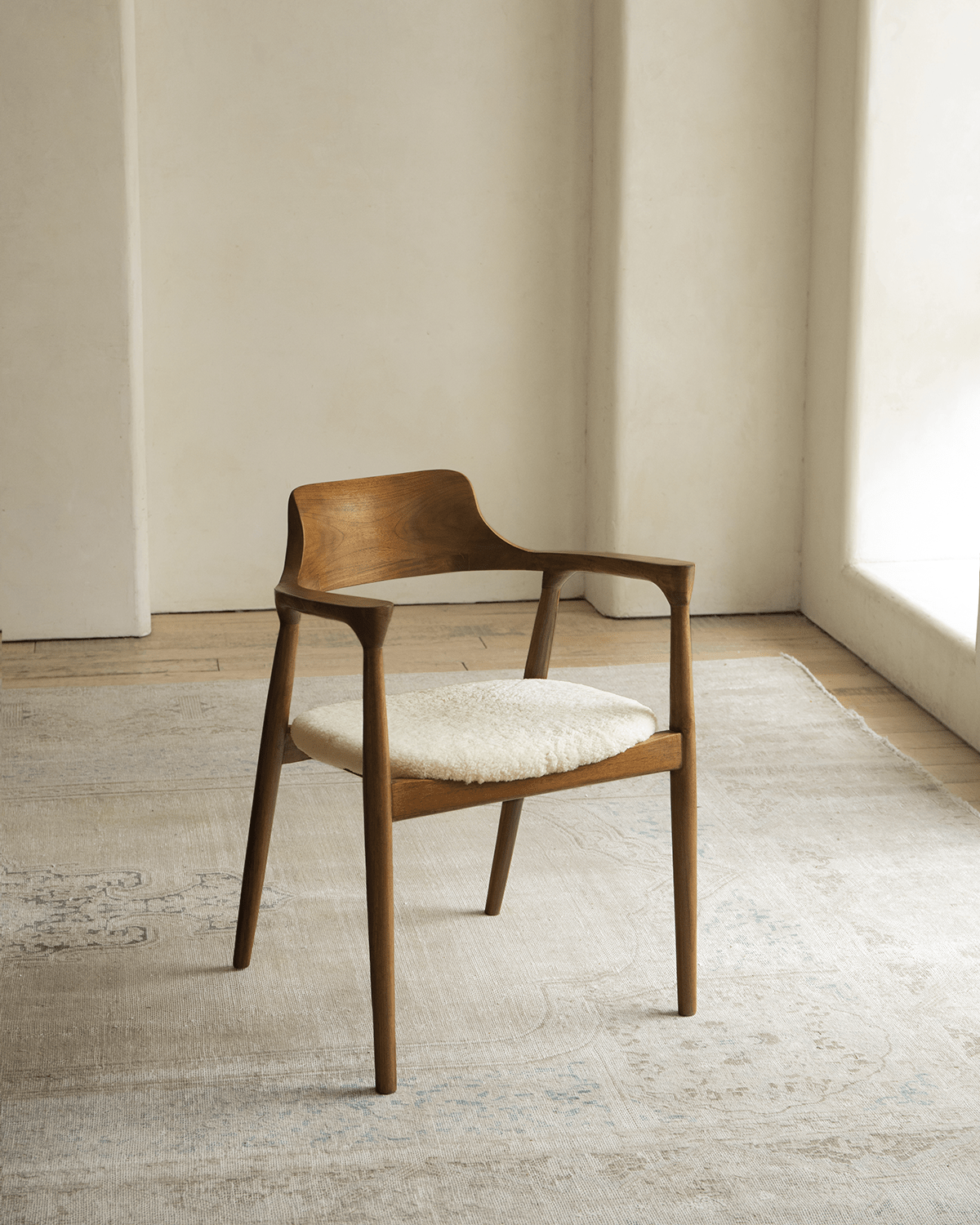 Hiroshima Chair in solid wood with plush seat, modern design for elegant living spaces