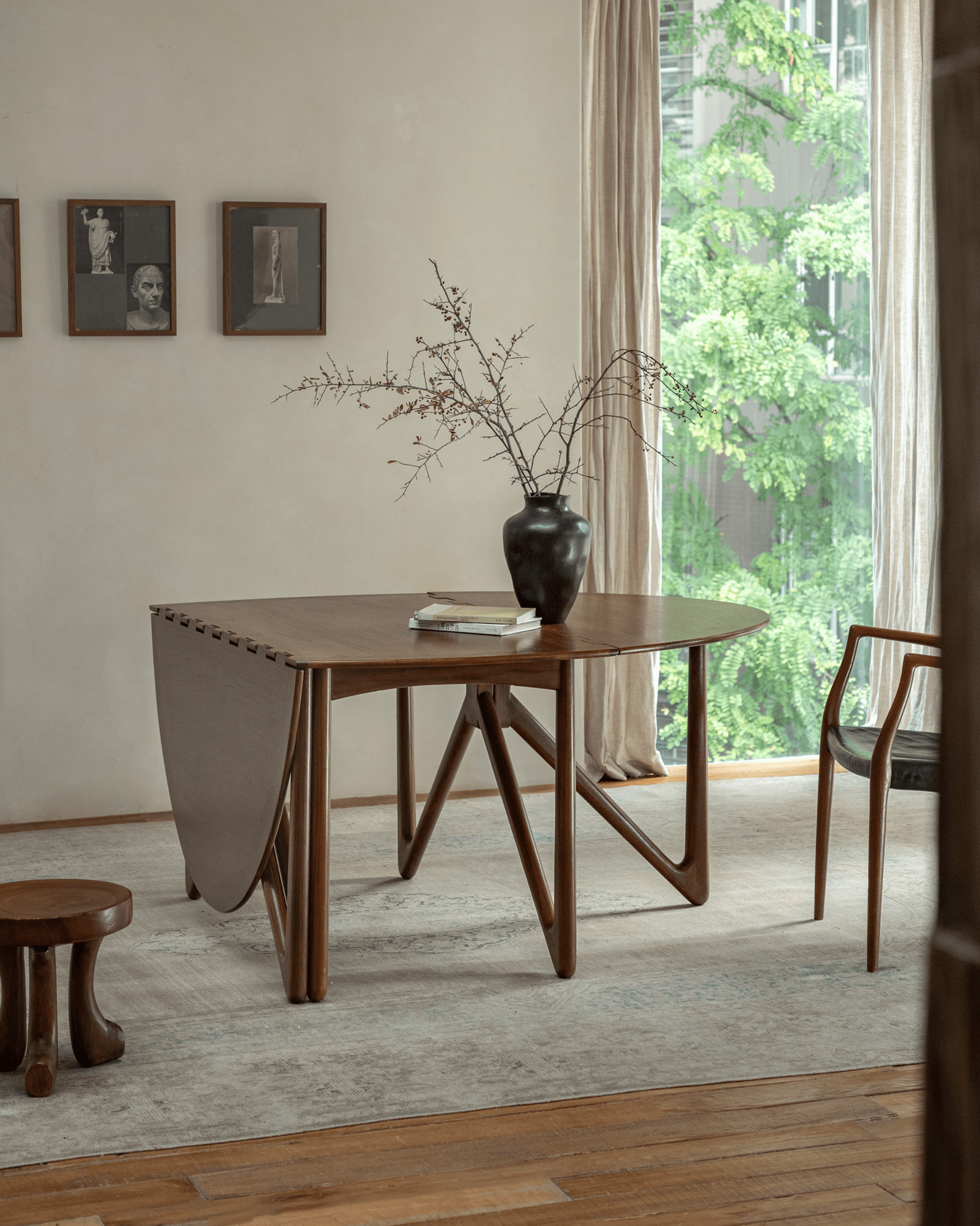 Niels Folding Table in teak wood, extended, V-shaped legs, mid-century modern design for dining or working.