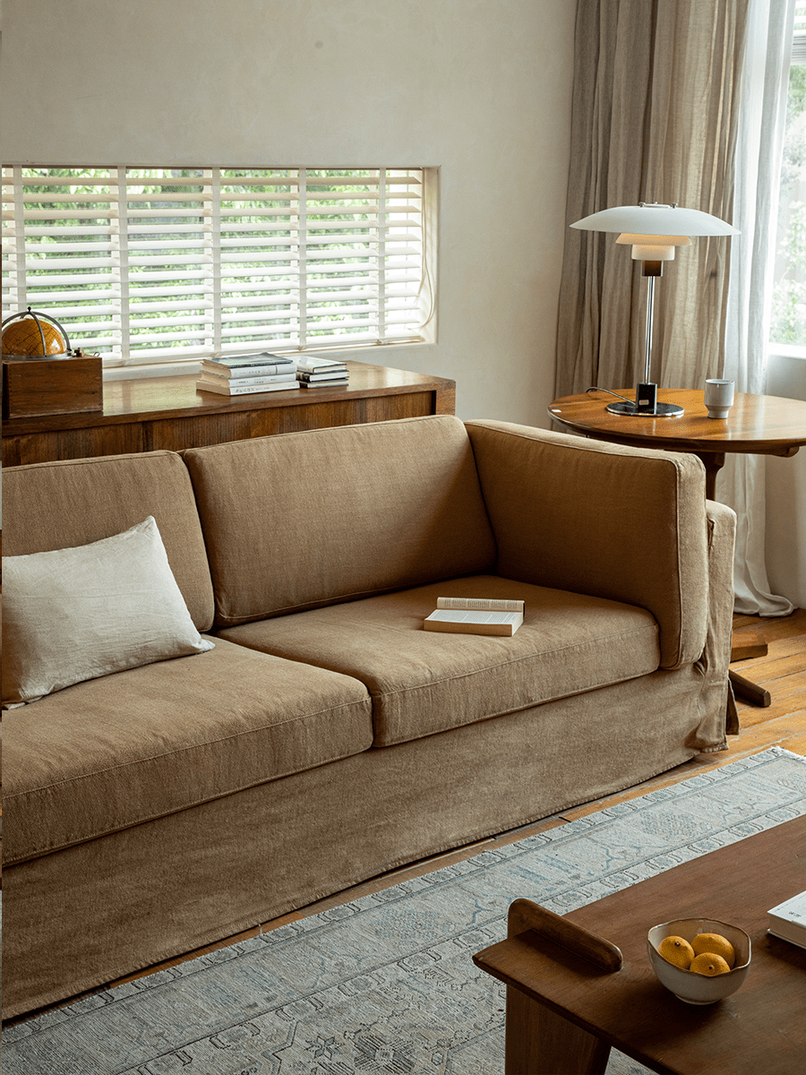Beige Skirt Linen Sofa in a modern living room, linen fabric and wooden furniture create a peaceful atmosphere