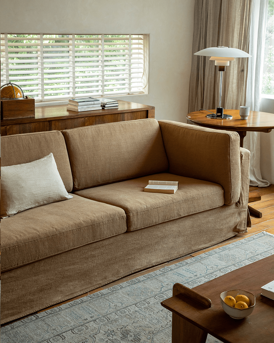 Beige Skirt Linen Sofa in a modern living room, linen fabric and wooden furniture create a peaceful atmosphere