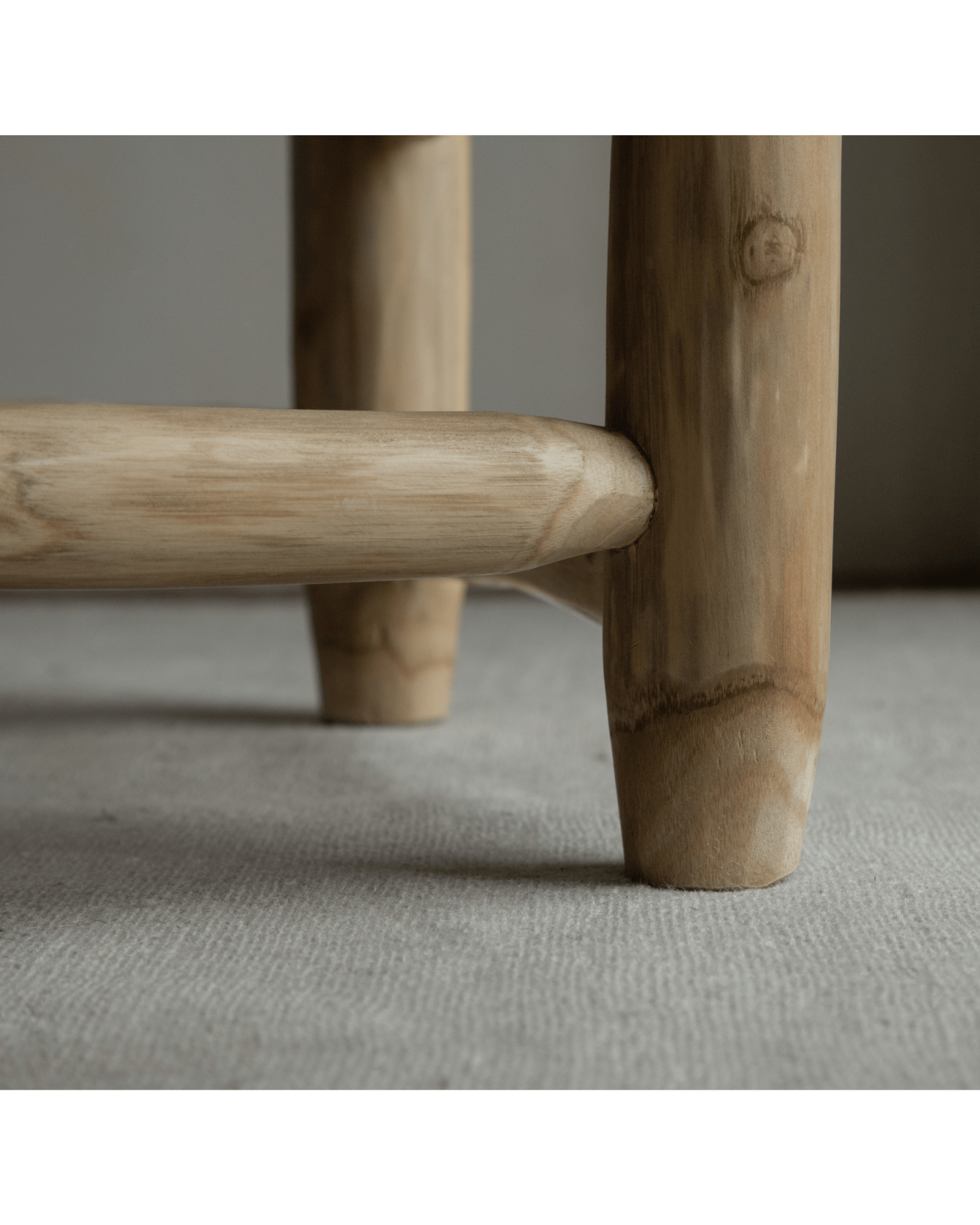 Isla Bench solid teak leg detail with mortise-and-tenon joinery, modern organic design