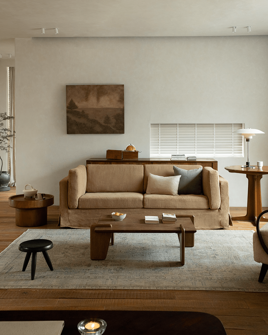 Beige Skirt Linen Sofa in a modern living room setting, linen fabric, peaceful atmosphere.