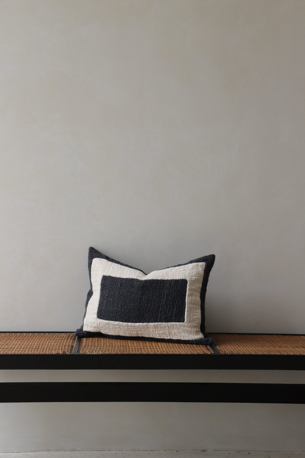 Cotton pillow with dark gray geometric design, modern home decor