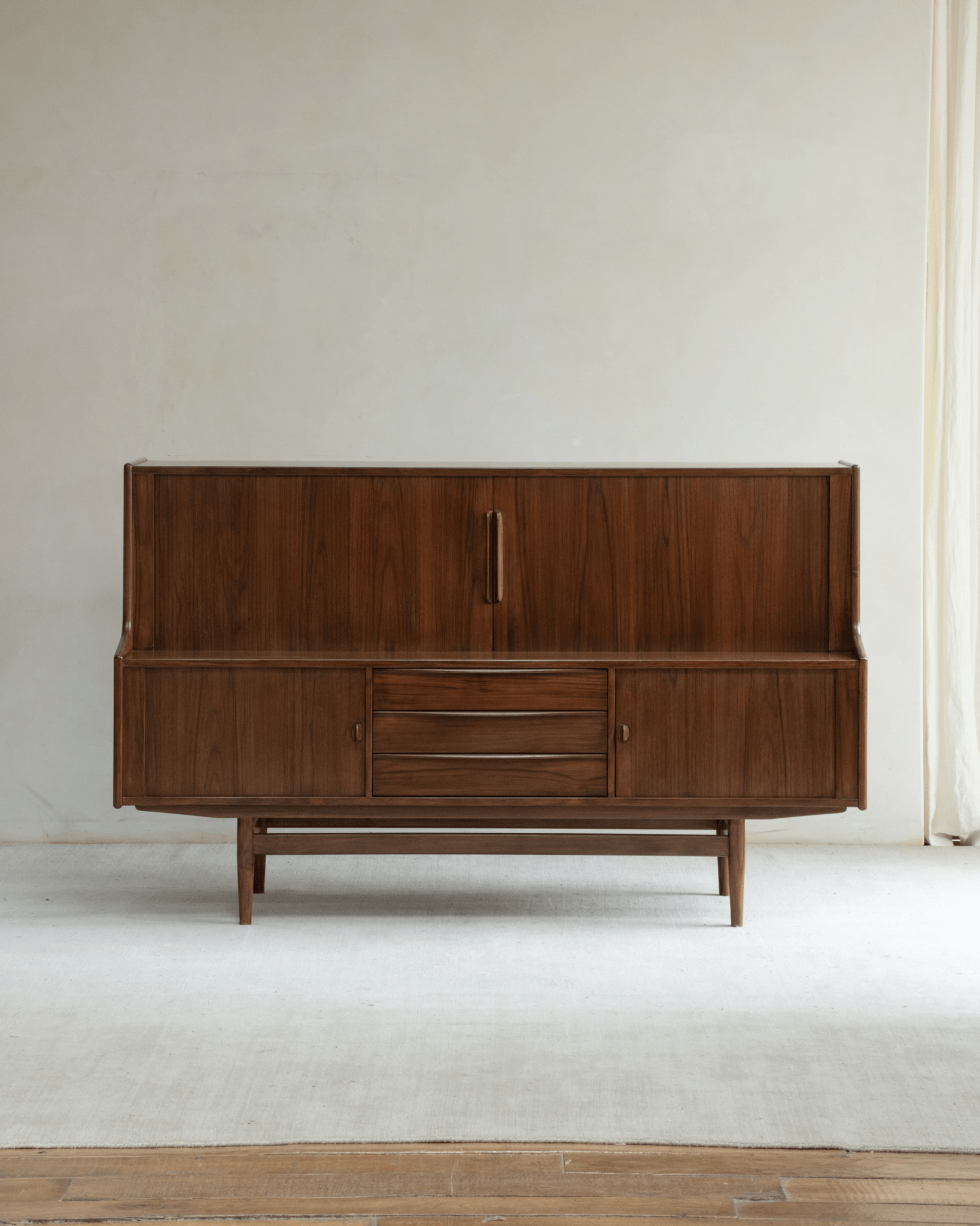 Ibu Teak Sideboard: Mid-century Danish teak wood with tambour doors and drawers.