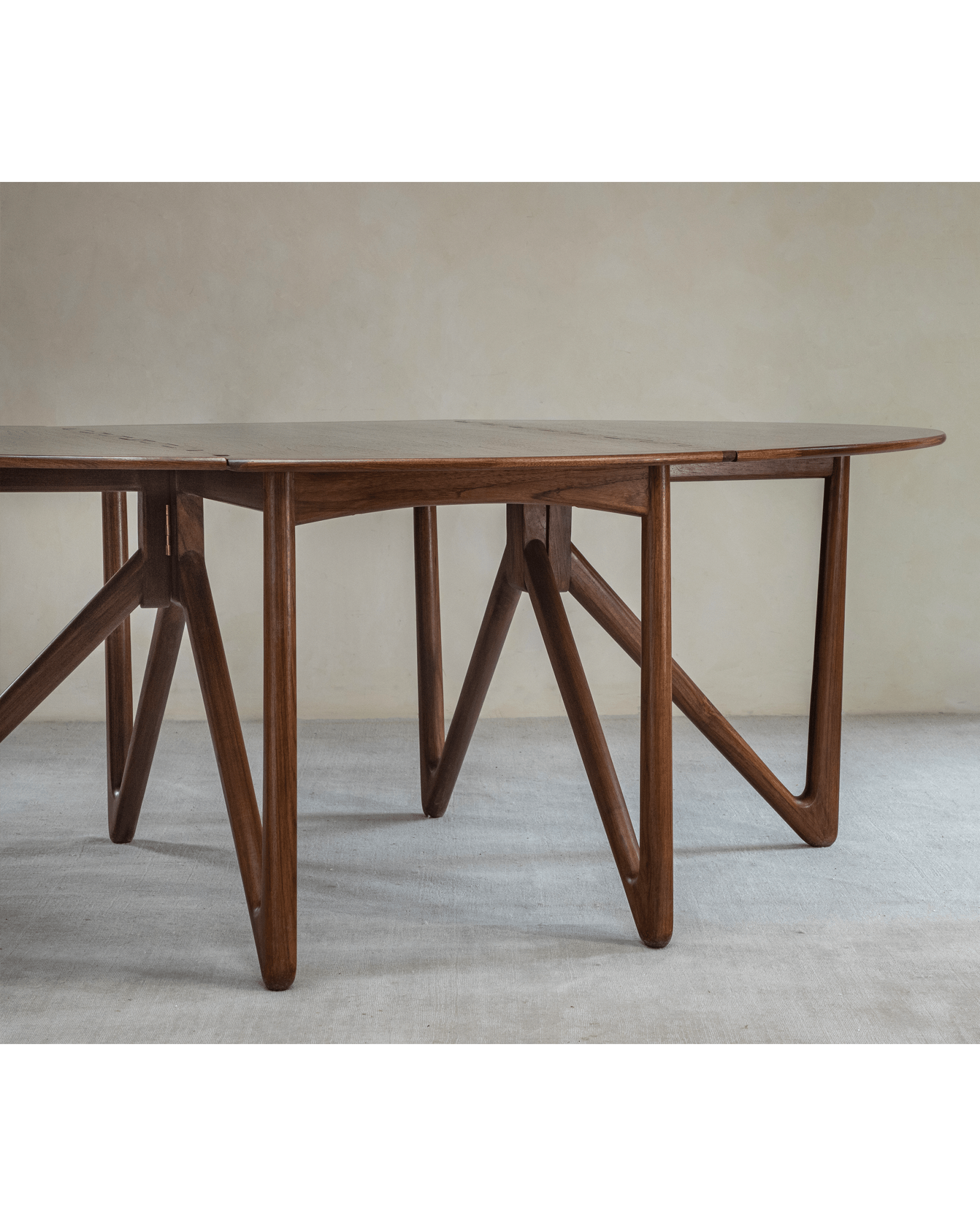 Niels Folding Table extended, Burmese teak wood with V-shaped legs, mid-century modern design