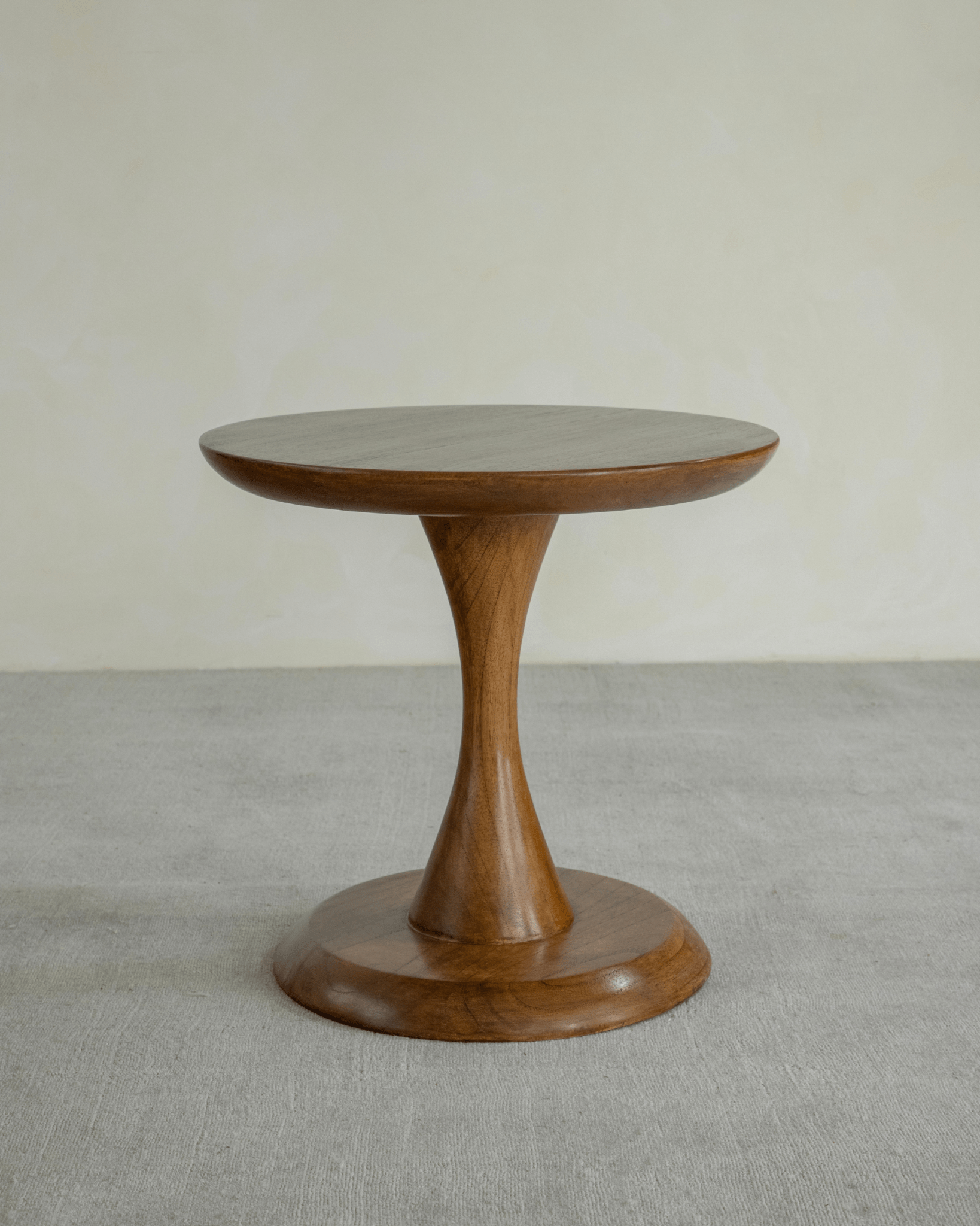 Spindle Side Table in Solid Teak - Compact, versatile side table with hourglass base, ideal for any room.