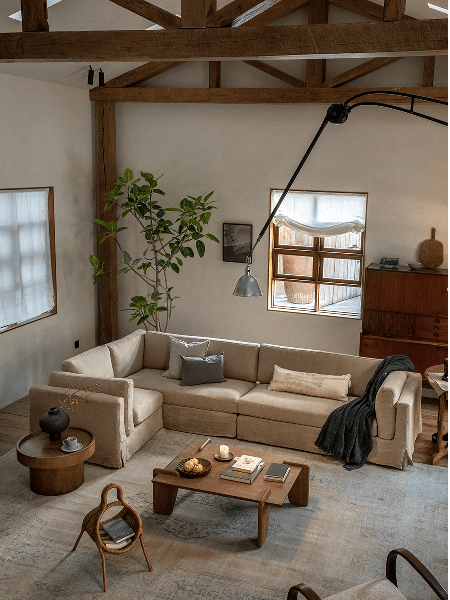 Beige linen Skirt Sectional Sofa in modern living room, modular design, relaxed atmosphere, customizable comfort