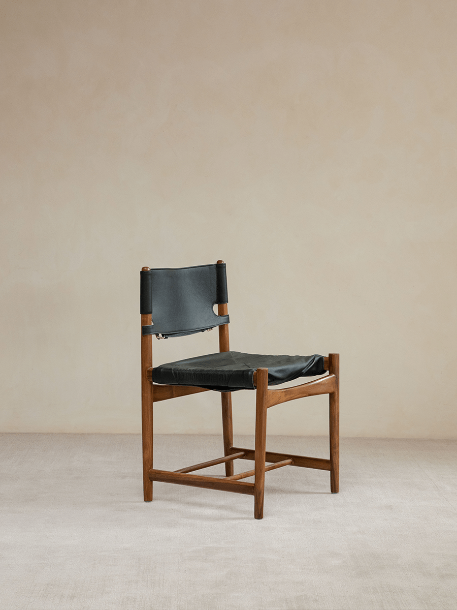 Spanish Dining Chair with black leather seat and teak wood frame, durable design