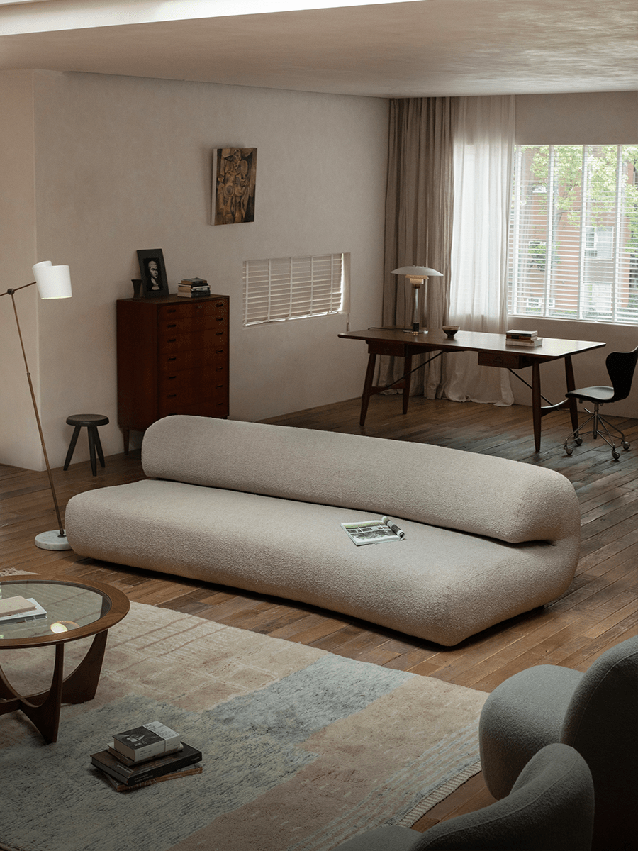 Wave Bouclé Sofa in a cozy, stylish interior setting, featuring soft bouclé fabric and unique wave design.