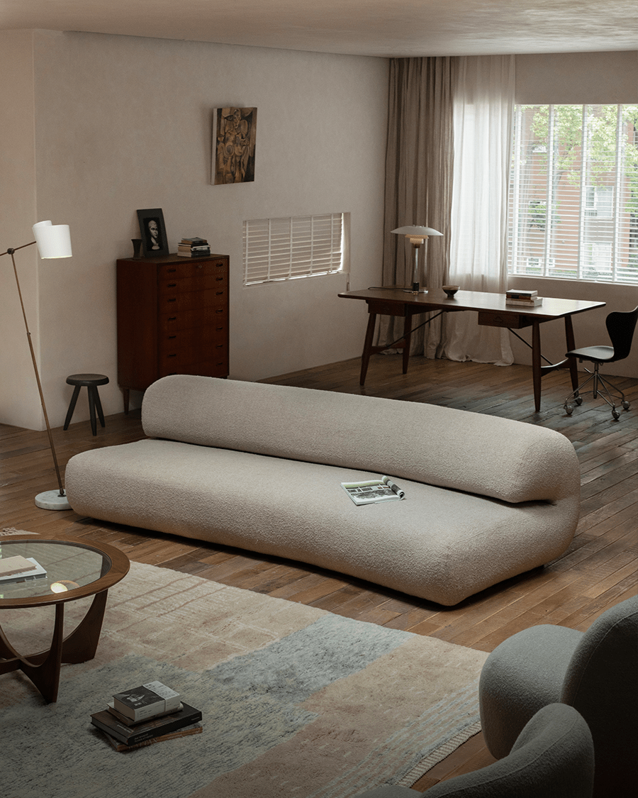 Wave Bouclé Sofa in a cozy, stylish interior setting, featuring soft bouclé fabric and unique wave design.