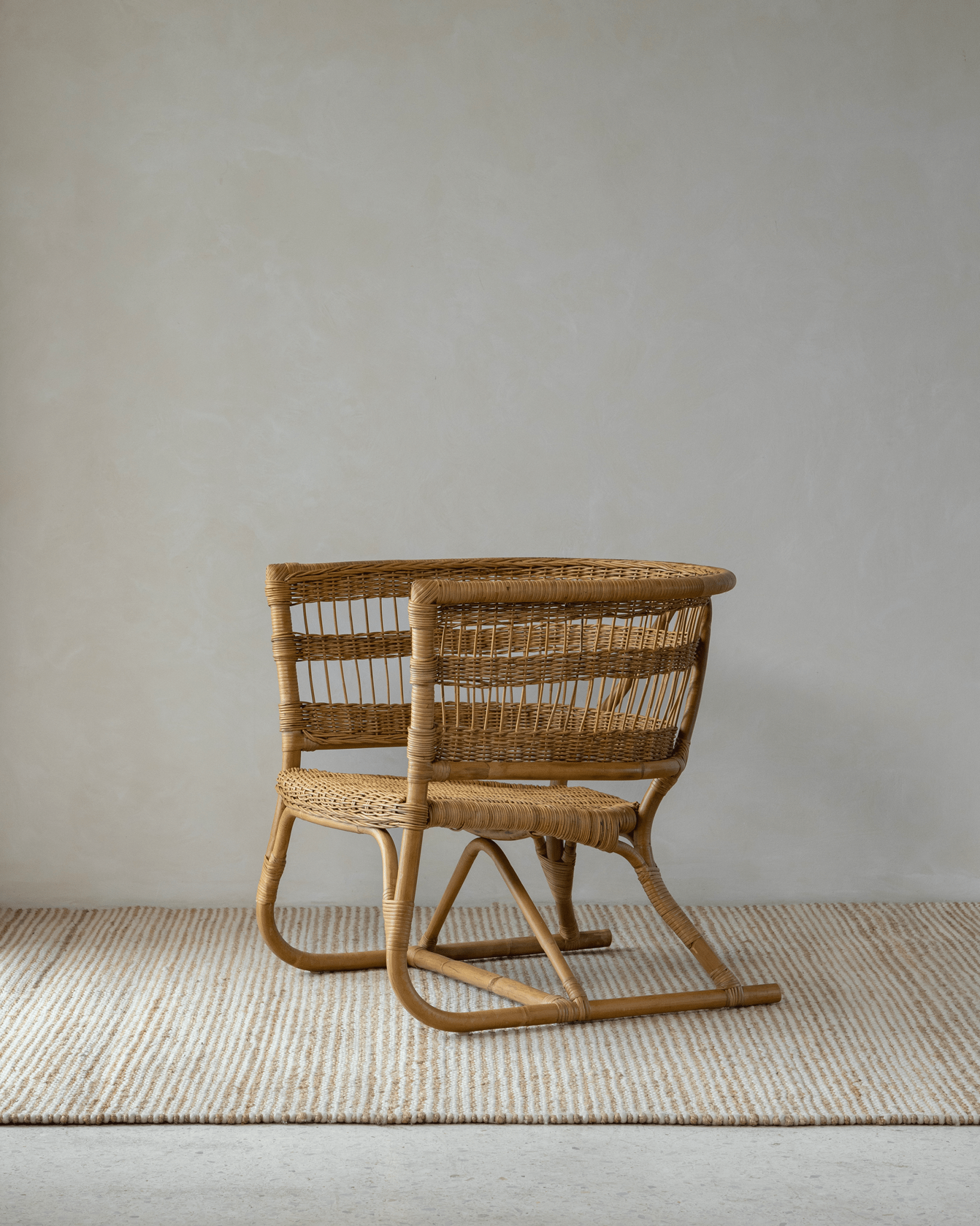 Helian Rattan Chair - natural rattan frame, cozy interior setting, stylish design, woven detail