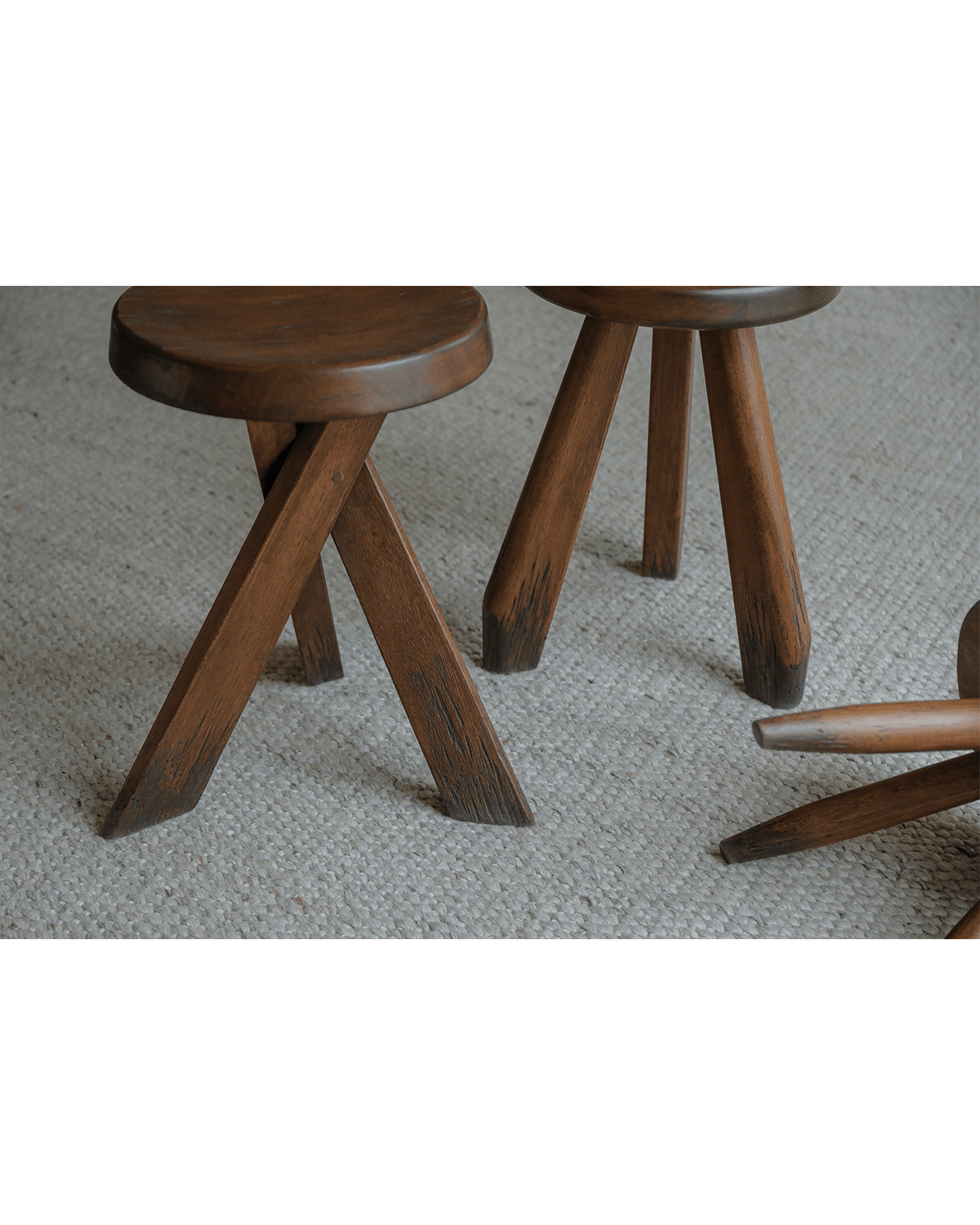 Set of solid wood French stools in natural finish, perfect for versatile seating and modern home decor
