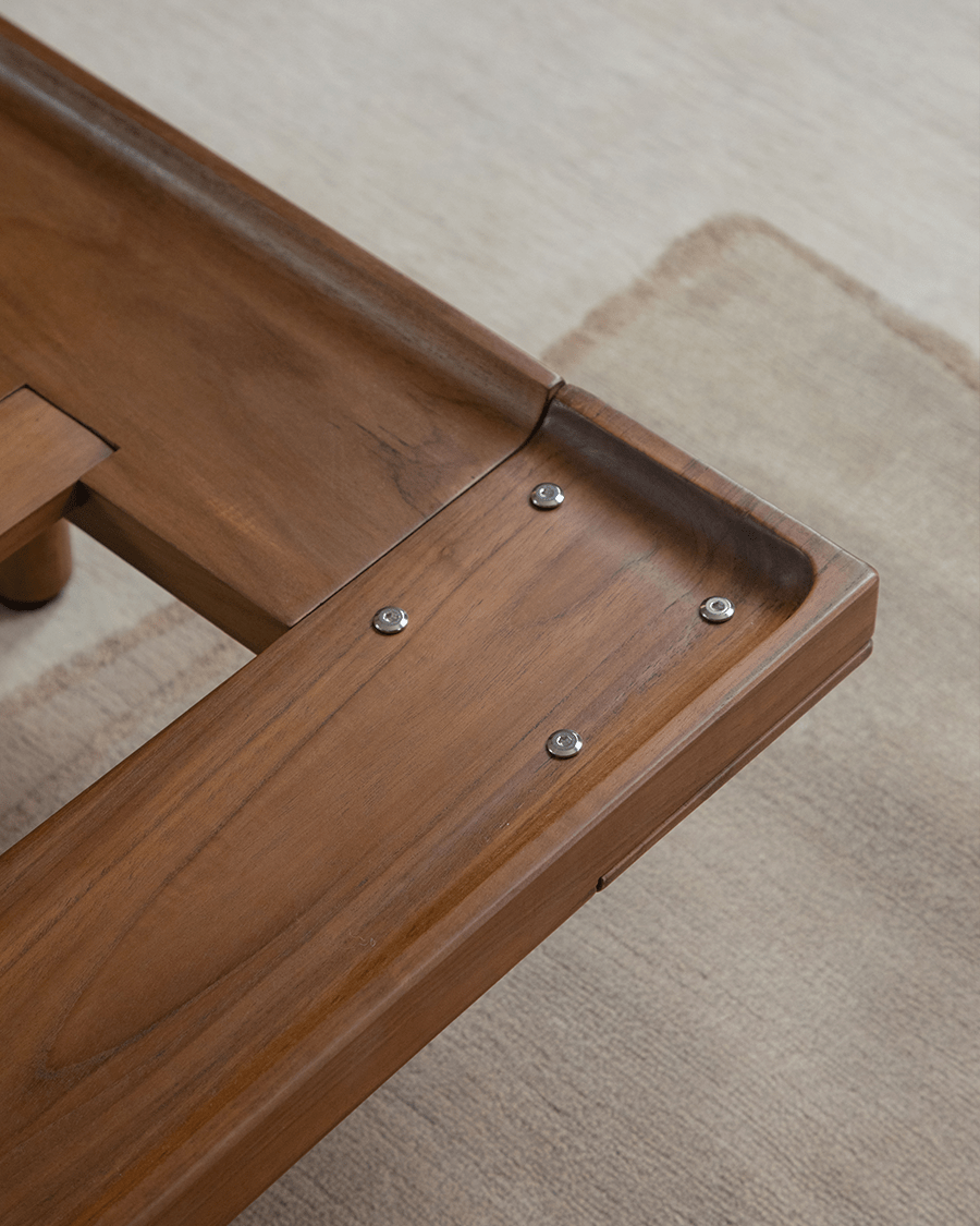 Seren Teak Linen Bed detail: Solid teak wood frame with metal bolt details, showcasing the bed's quality.