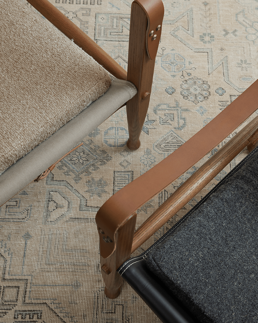 Safari Chair detail: US Red Oak frame, leather armrest, canvas seat and black leather backrest, elegant portable design