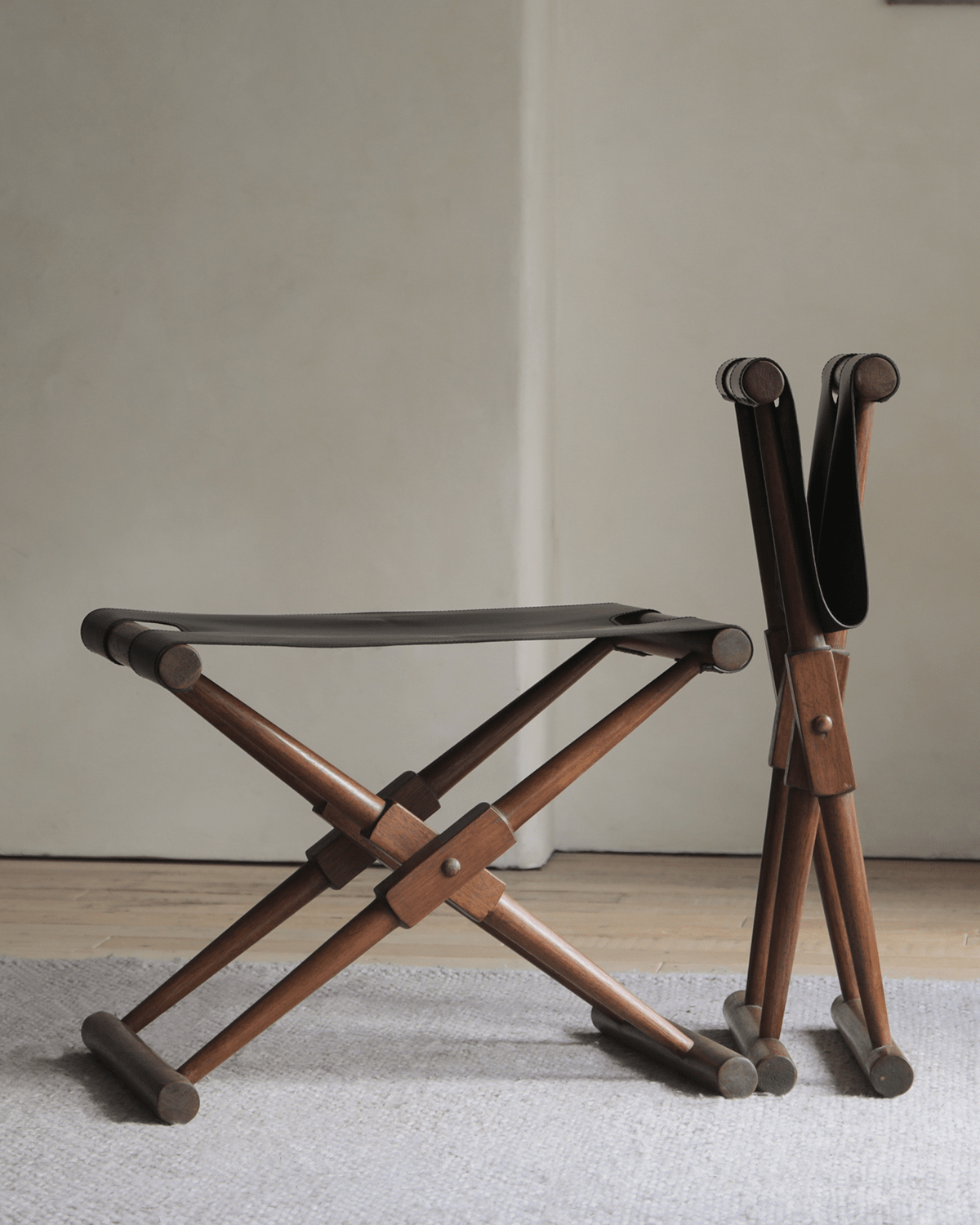 Lux Leather Stool - Foldable leather and teak stool, perfect for versatile home use.