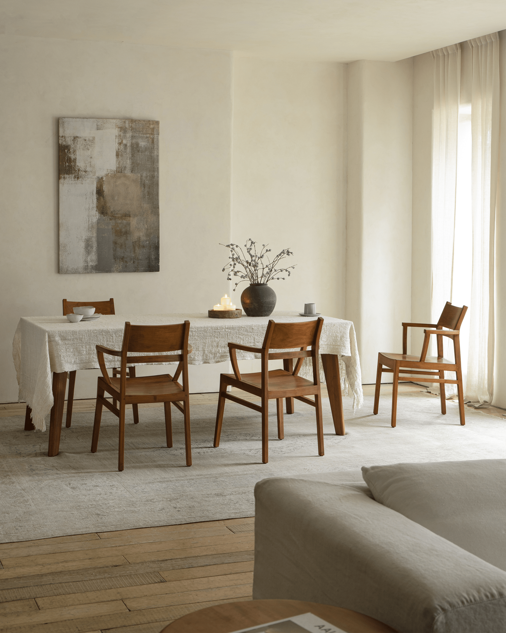 Wooden Hug Chair set in dining room with natural light, modern furniture