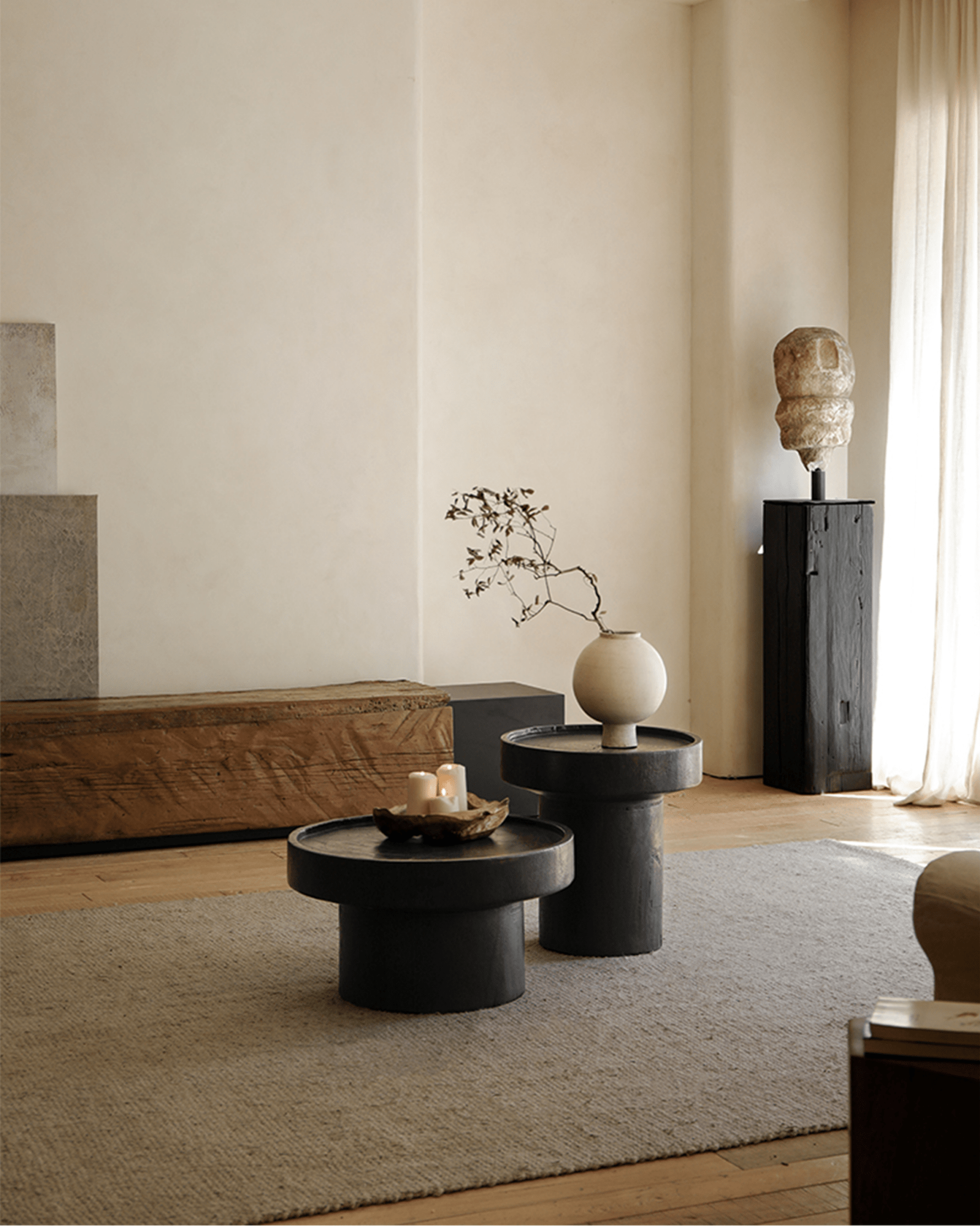 Stamp Coffee Table in carbonized black, sculptural design, modern living room decor