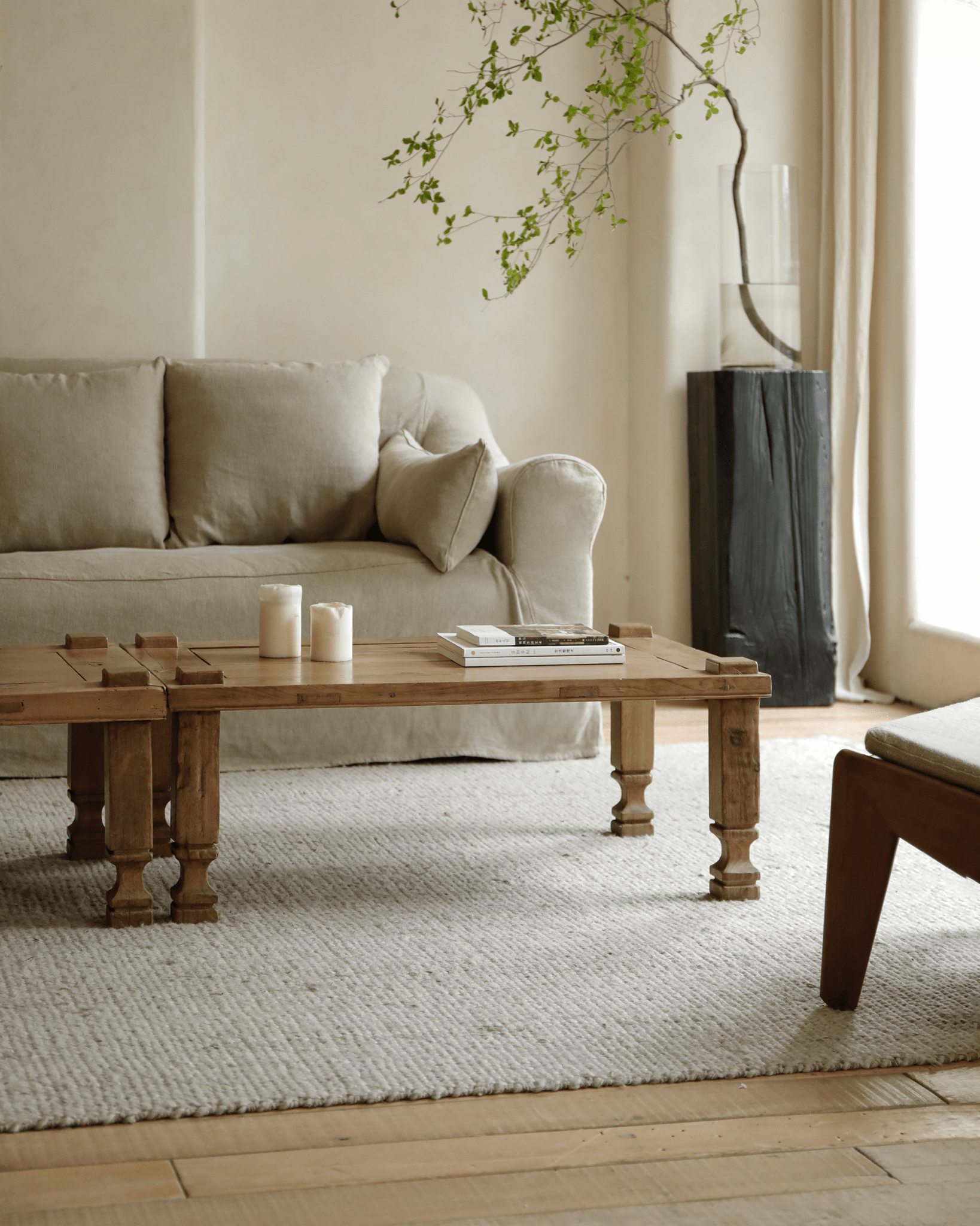 Keoni Coffee Table in a natural living room setting, showcasing reclaimed wood, rustic design, and simple aesthetics.