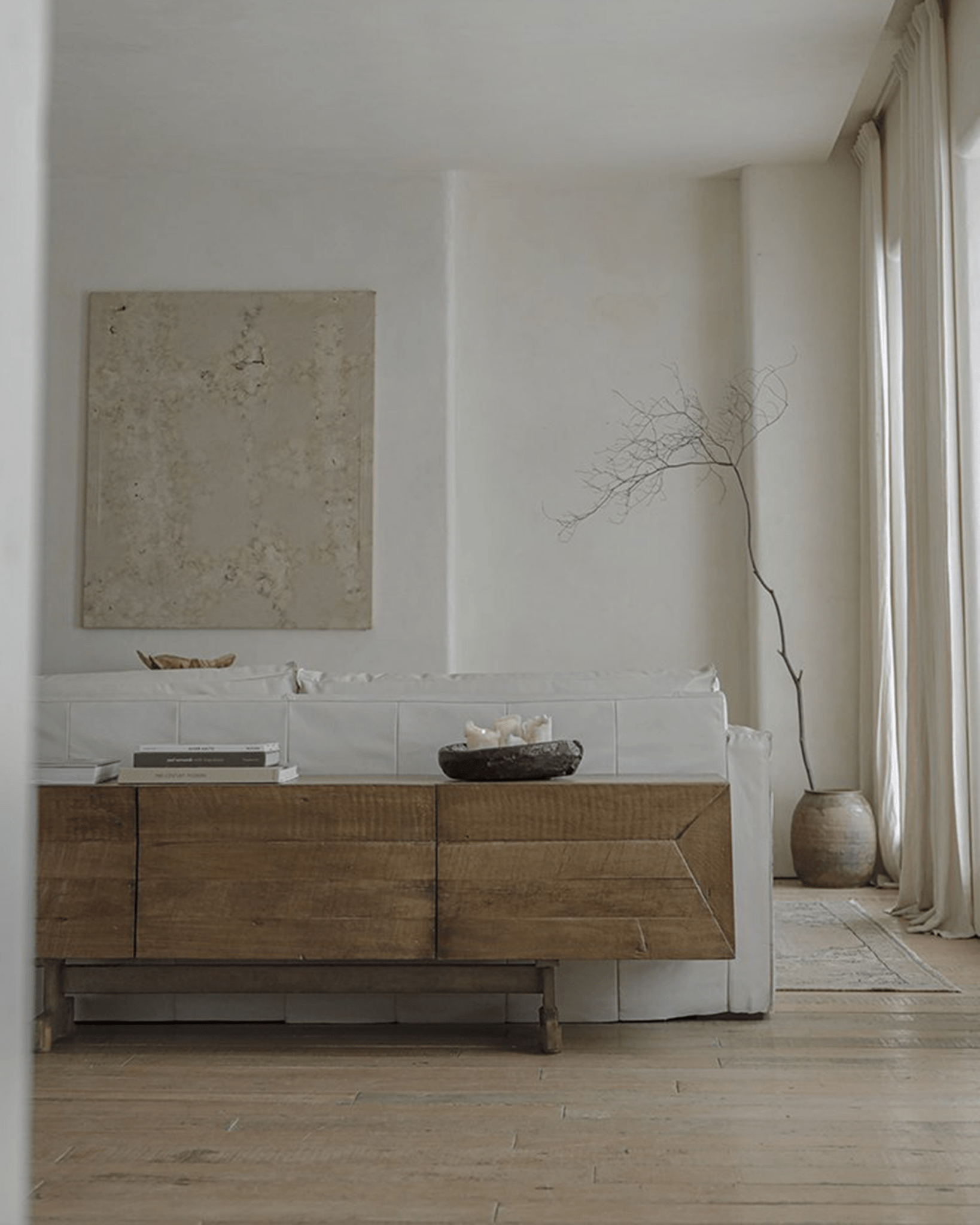 No.3 Sideboard in a modern room setting with reclaimed wood, geometric panels, and natural elements