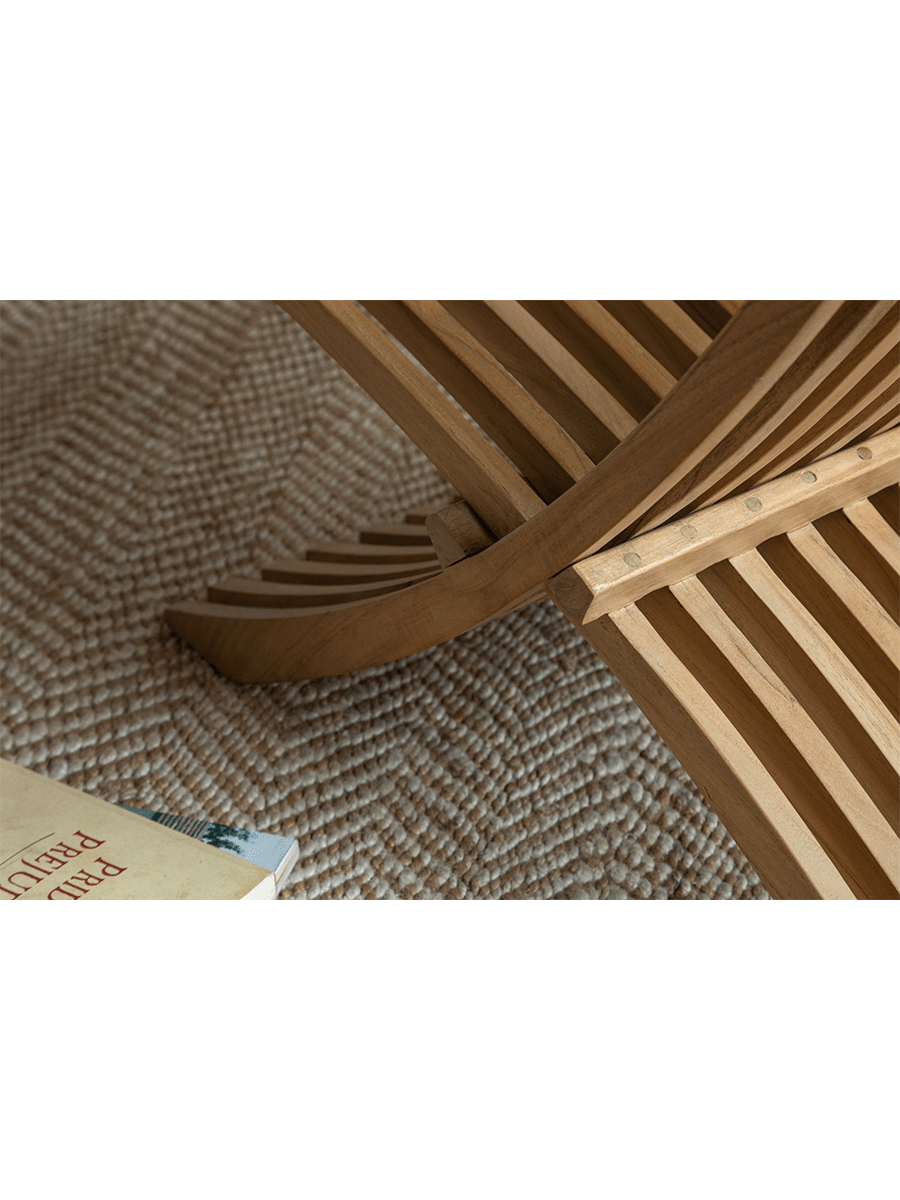 Oly Lounge Chair wooden slatted design, ergonomic and stylish seating, ideal for indoor and outdoor relaxation.