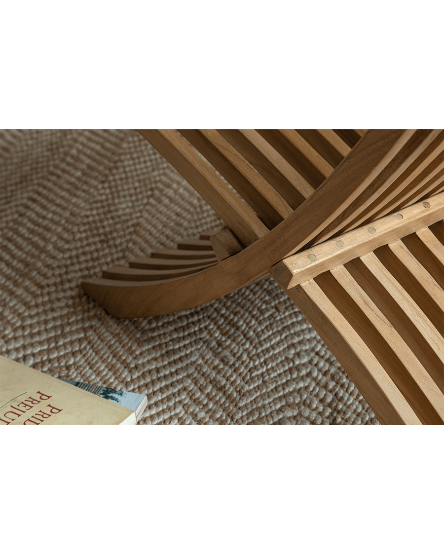 Oly Lounge Chair wooden slatted design, ergonomic and stylish seating, ideal for indoor and outdoor relaxation.